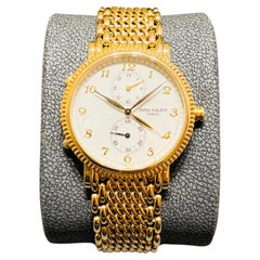 (Pre Owned) 5034/1J - Travel Time -Bracelet Yellow Gold.