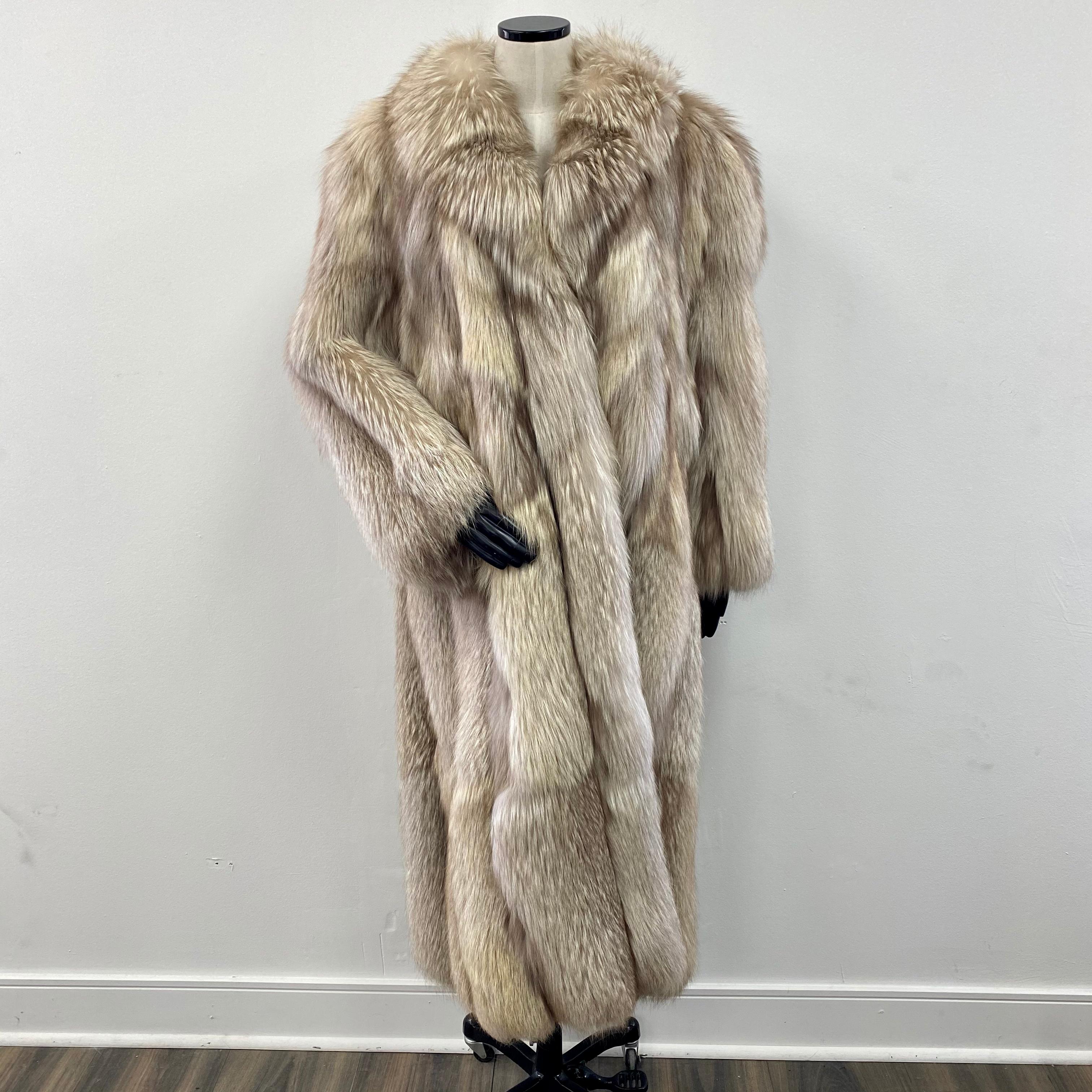 PRODUCT DESCRIPTION:

Anthony Holmgren silver fox fur mid-length coat

Condition: Like new

Closure: German hooks

Color: Brown and Silver

Material: Silver fox fur

Garment type: Mid length Coat

Sleeves: Straight

Pockets: Two side