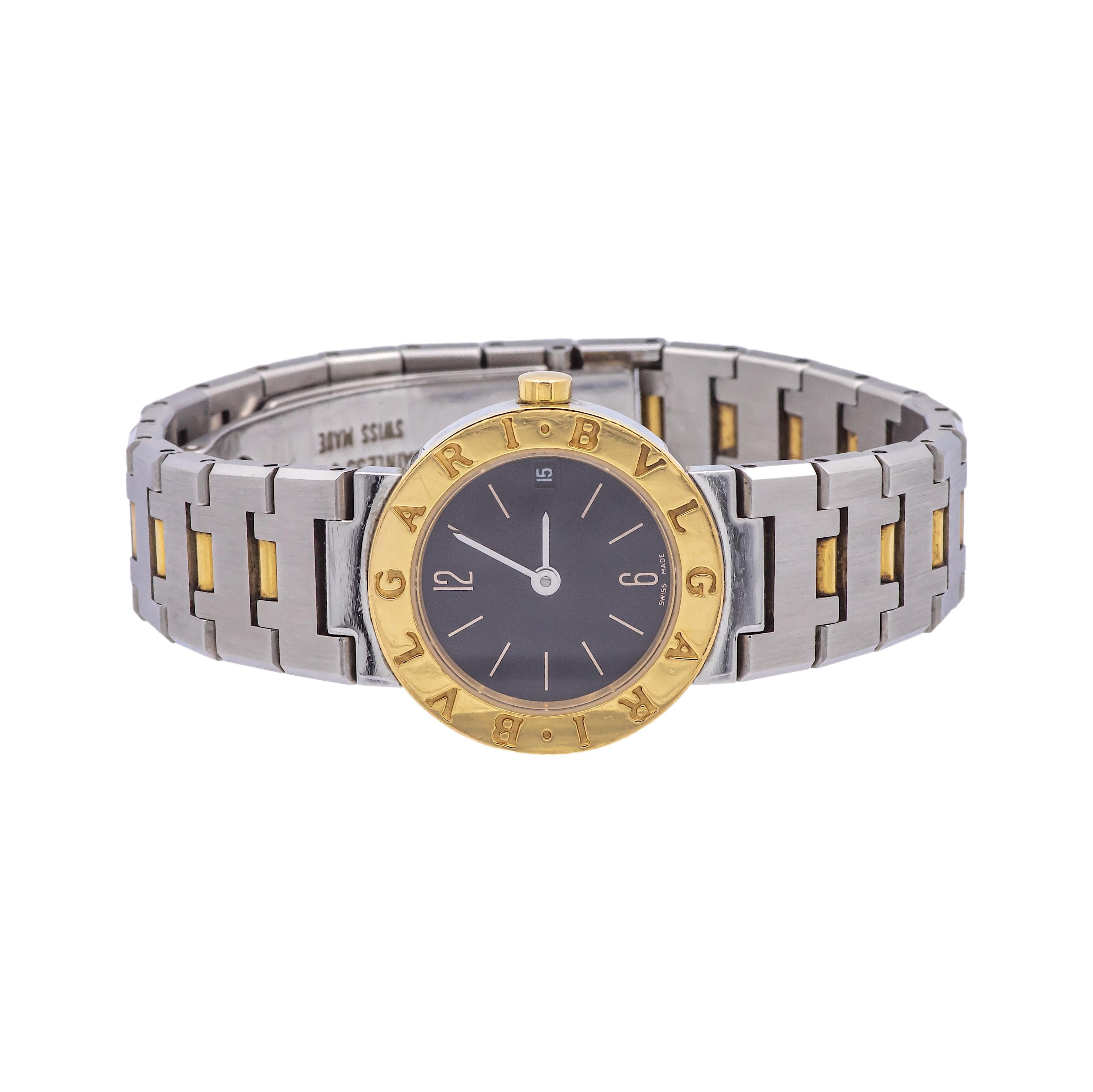 Classic pre-owned Bvlgari Bvlgari quartz ladies watch with model BB23SGD finely crafted in 18K Yellow Gold & Stainless Steel bracelet with a Stainless Steel Deployant buckle. This Bvlgari watch has a 23 mm case with a Round caseback and Black face