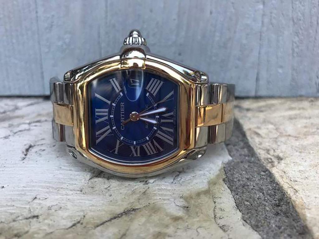 Pre-Owned Cartier Limited Edition Roadster Centennial Blue Dial Steel & 18K Watch

Reference no: 2510
Movement: automatic
Case material: stainless steel &18ky
Condition: like new excellent pre-owned
Case measurements: 38mm x 44mm (not including