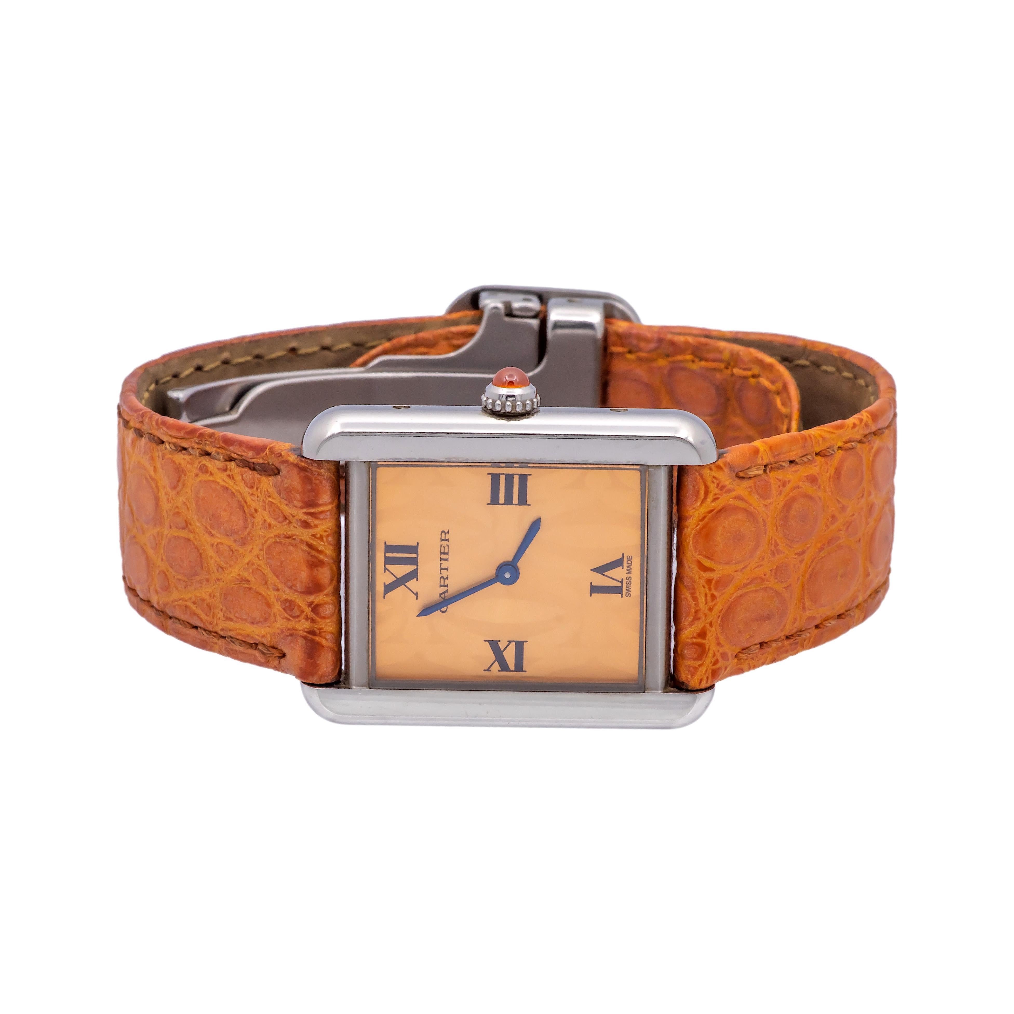 Pre-Owned Cartier limited edition watch from the Tank Solo collection with model number 2716 featuring a stainless steel frame with an orange logo dial, roman numeral markers and matching orange alligator strap. This watch is powered by a quartz