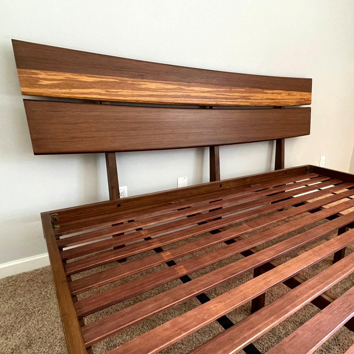 The Azara king platform bed features contemporary styling, clean lines and beautiful Tiger bamboo accent. Crafted in 100% solid Moso bamboo, no particle board or MDF. This bed is solid throughout! Outstanding beautiful design combined with rich