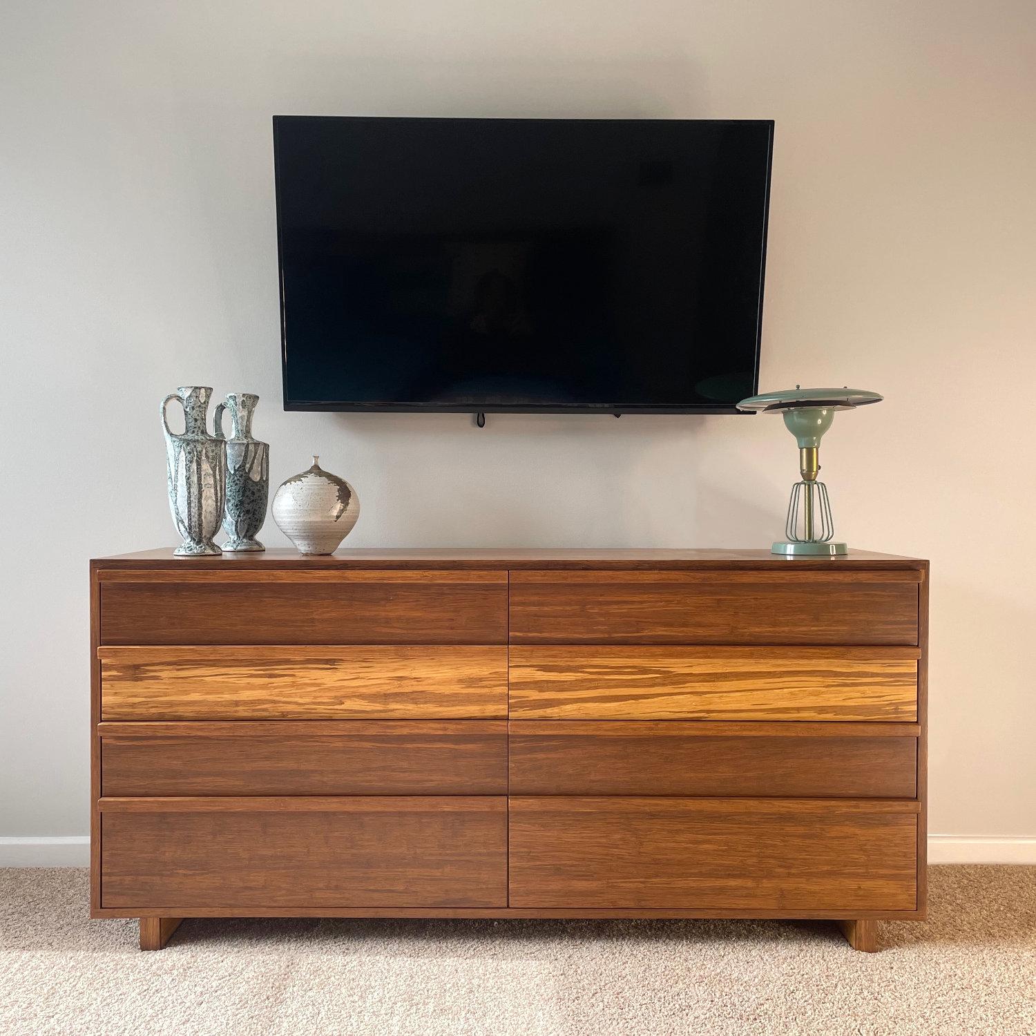 Two identical dressers available. Price is per dresser.

Contact us if you want a combined shipping rate for both dressers.

Pre-owned Greenington Magnolia dressers. Each of 8 drawers feature contemporary styling, clean lines and beautiful tiger