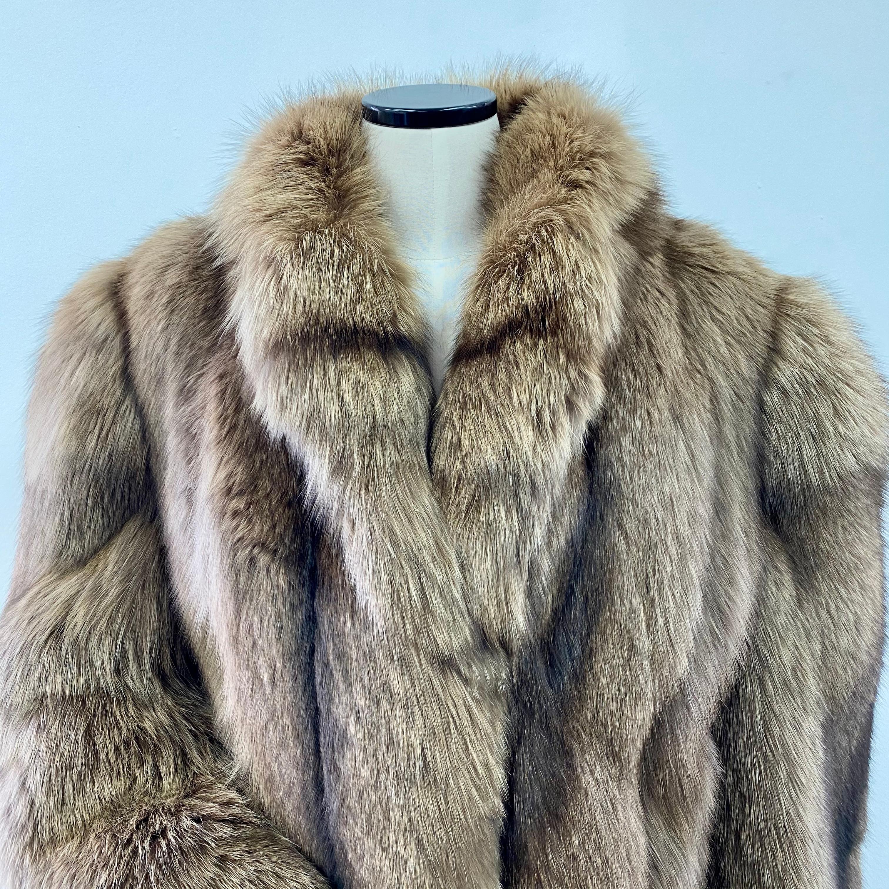 PRODUCT DESCRIPTION:

Holt Renfrew dyed silver fox fur stroller coat

Condition: Pristine

Closure: German hooks

Color: Brown

Material: Silver fox fur

Garment type: Stroller Coat

Sleeves: Straight

Pockets: Two side pockets

Collar: