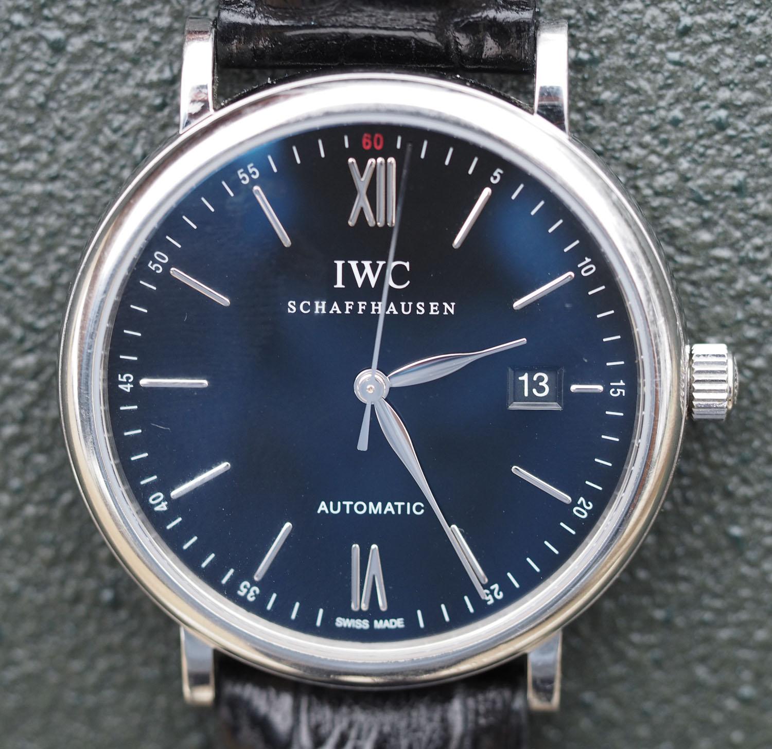 One Pre-Owned IWC Gents Stainless Steel Portofino Automatic (Self-Winding) Wristwatch on a Black Strap.  The watch measures 40mm in diameter. 

Please see some additional features:
Height 9.2 mm
Water resistance 3 bar
42 hours Power