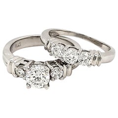 Pre-Owned Platinum Engagement Set with 0.66 Carat Center Round Diamond