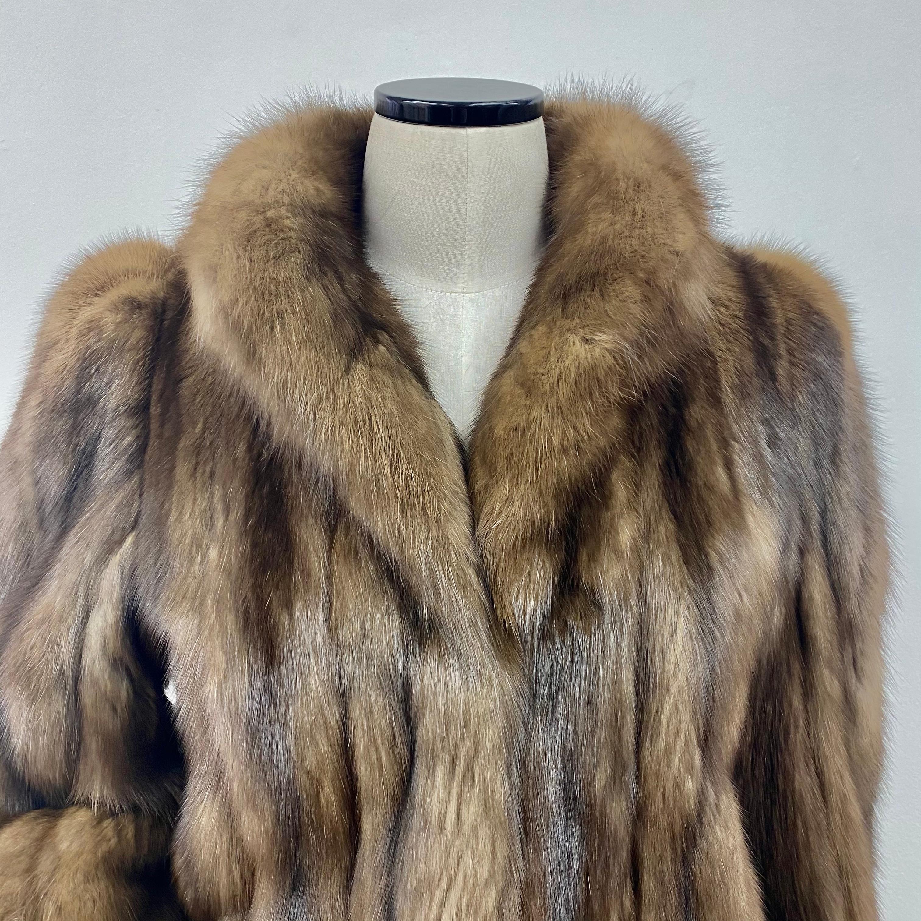 PRODUCT DESCRIPTION:

Exceptional Roberts San Francisco Russian Sable fur jacket with stunning silver highlights, extremely light and soft

Condition: Vintage New

Closure: German hooks

Color: Russian Sable 

Material: Russian Sable 

Garment type: