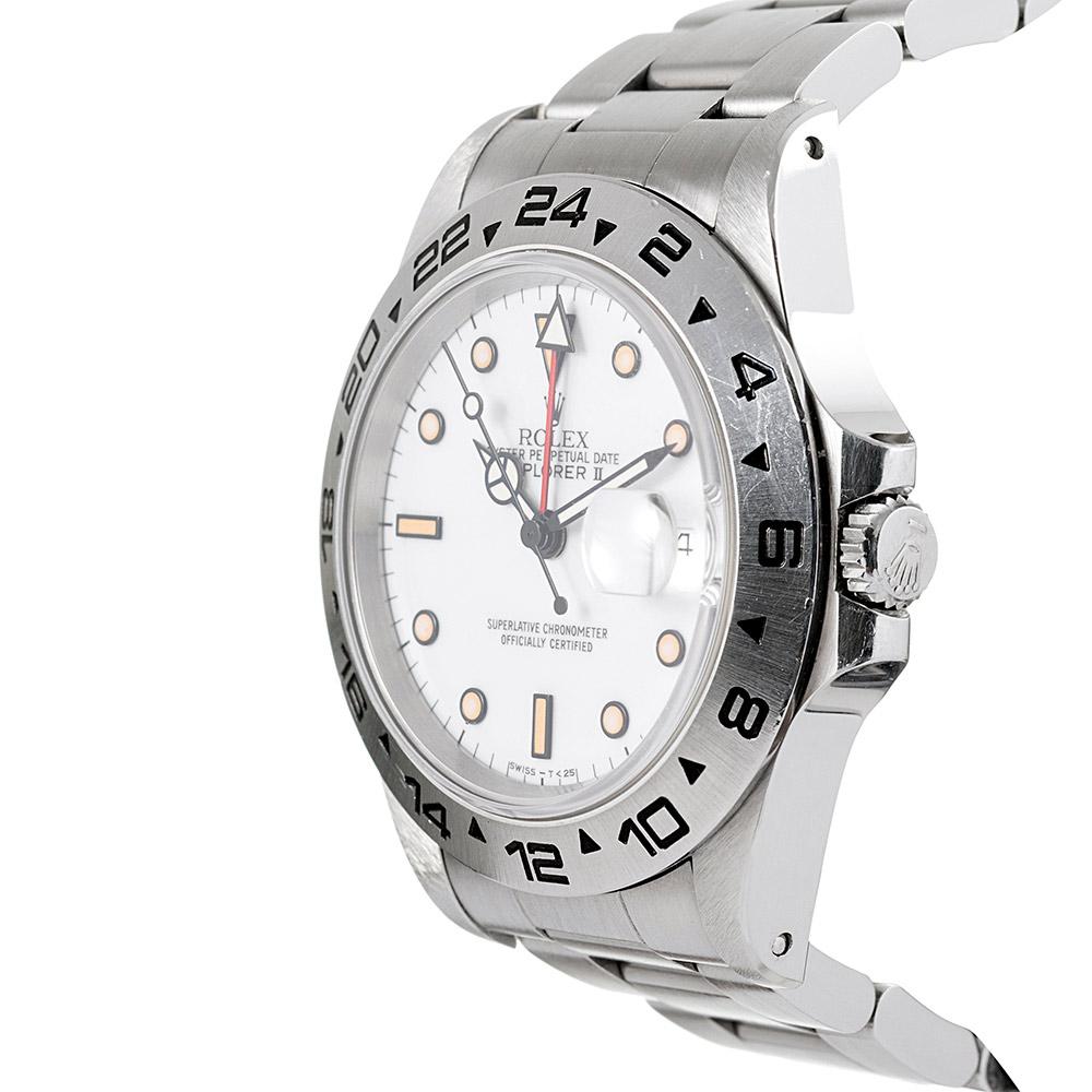 Remaining in crisp like new condition, the watch has never been polished and will suit the preference of the discerning collector. The pumpkin patina color is an incredible and attractive contrast to the white dial and certainly augments the
