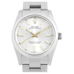 Pre-Owned Rolex Oyster Perpetual 124200: Men's Silver Dial, Random Serial Watch