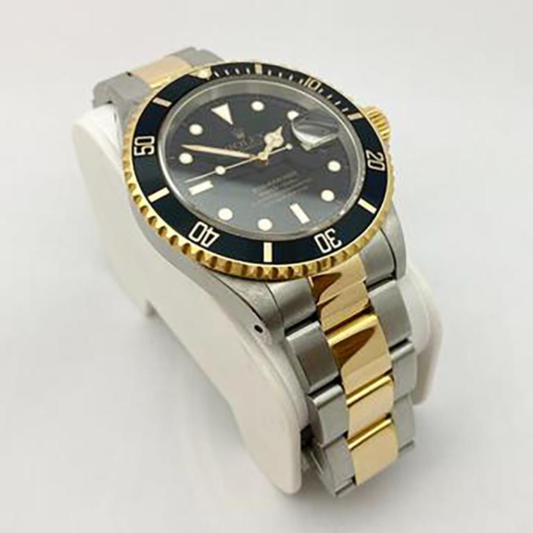 Pre-Owned Rolex Submariner Black Dial and Bezel Steel 18Ky 16613 1997 Box/Papers In Excellent Condition In Carmel-by-the-Sea, CA