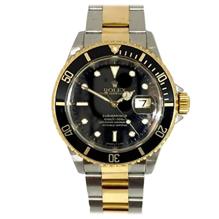 Pre-Owned Rolex Submariner Black Dial and Bezel Steel 18Ky 16613 1997 Box/Papers