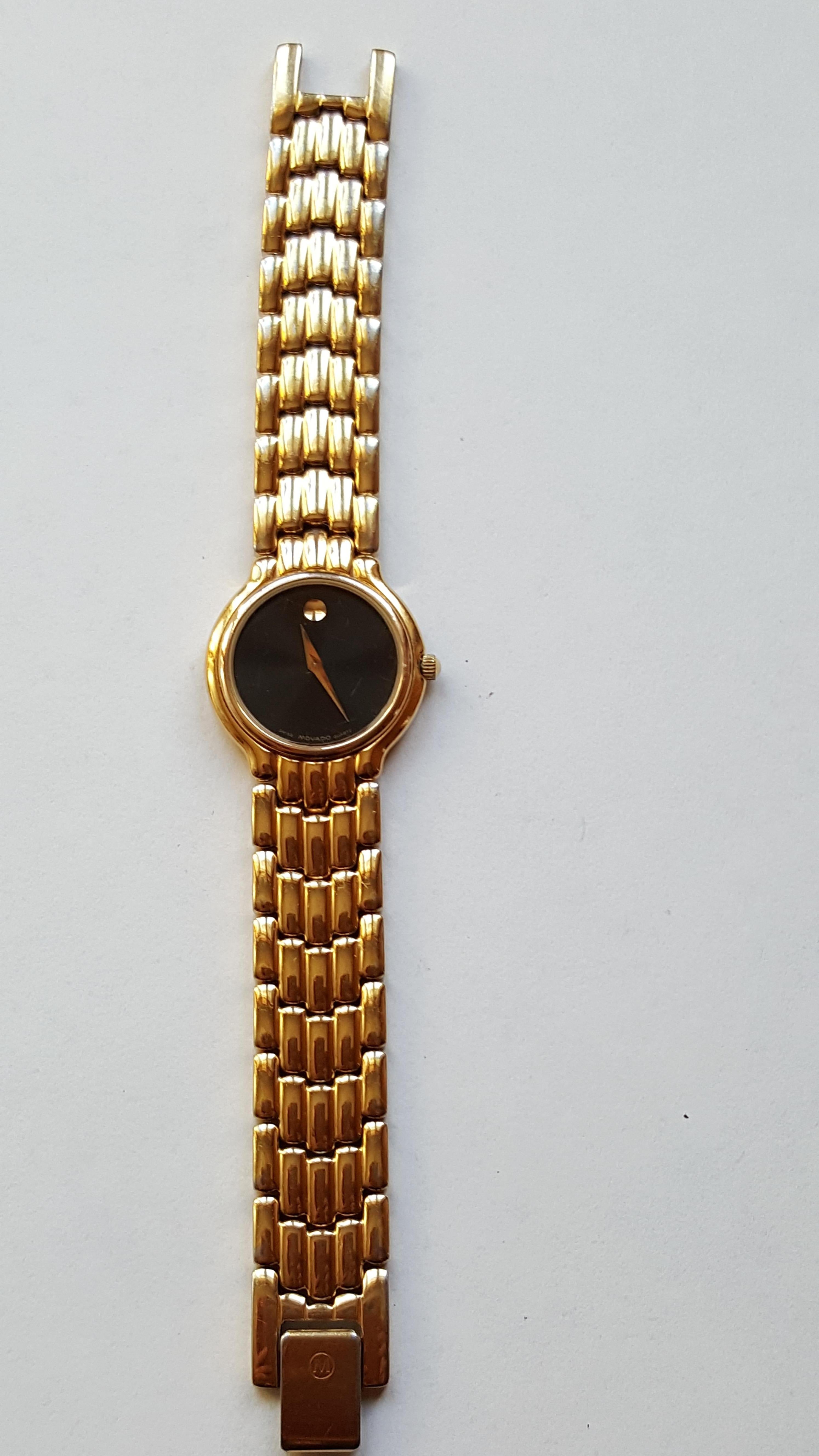 Pre-owned Watch 24mm Case Black Face Movado Museum, Ladies Water Resistant, Quartz, Gold Plated and Stainless Steel 6 Inch Length. This watch is sold as is, before shipping we'll put a new battery in the watch.

This watch has not been serviced with