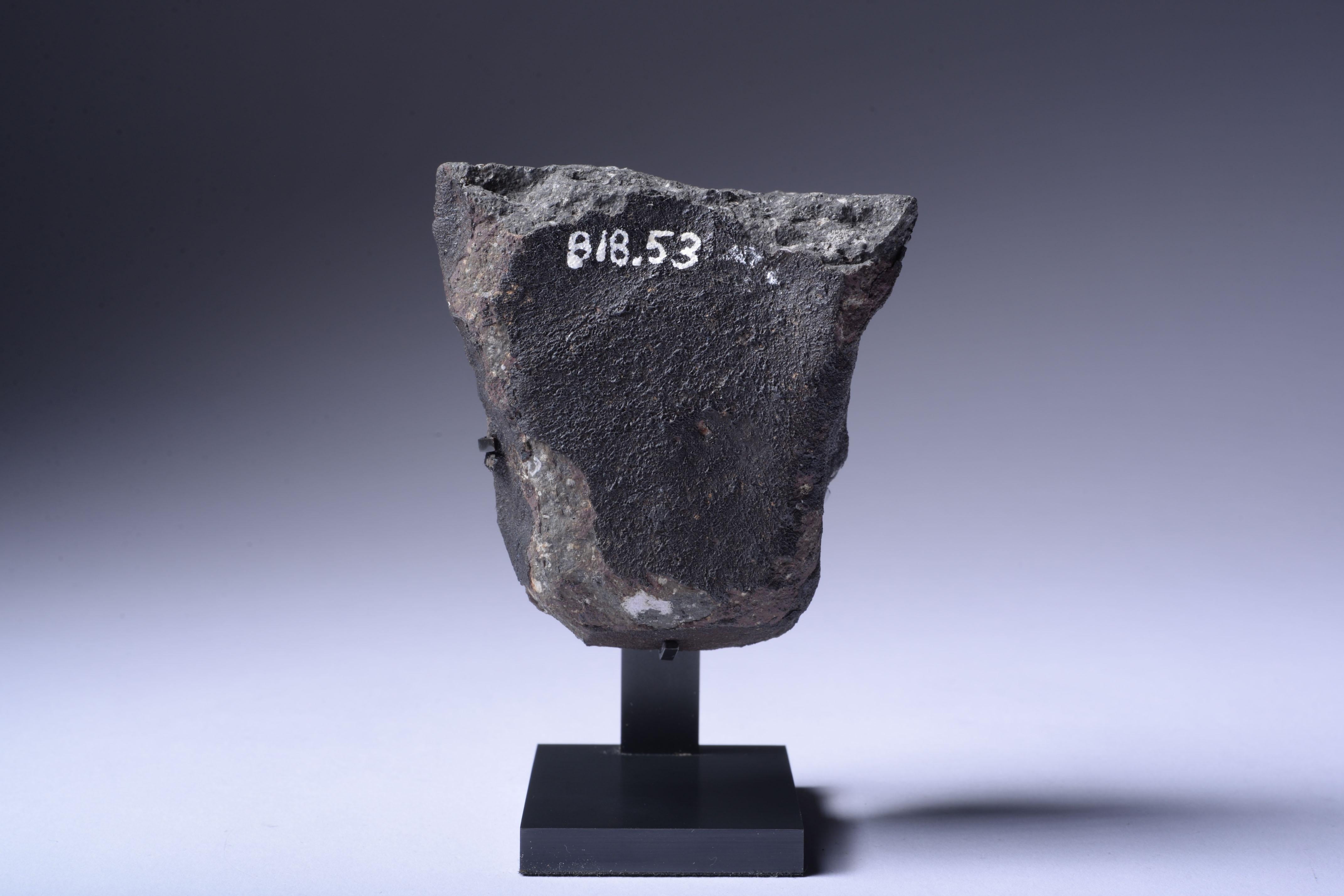 Pre-Solar Stardust - A piece of the Allende Meteorite
Carbonaceous Chondrite - CV3
Height 6.98 cm
280 g

“This individual sample of the Allende CV3 carbonaceous chondrite shows an incomplete millimeter-thick fusion crust. In crust-free patches,