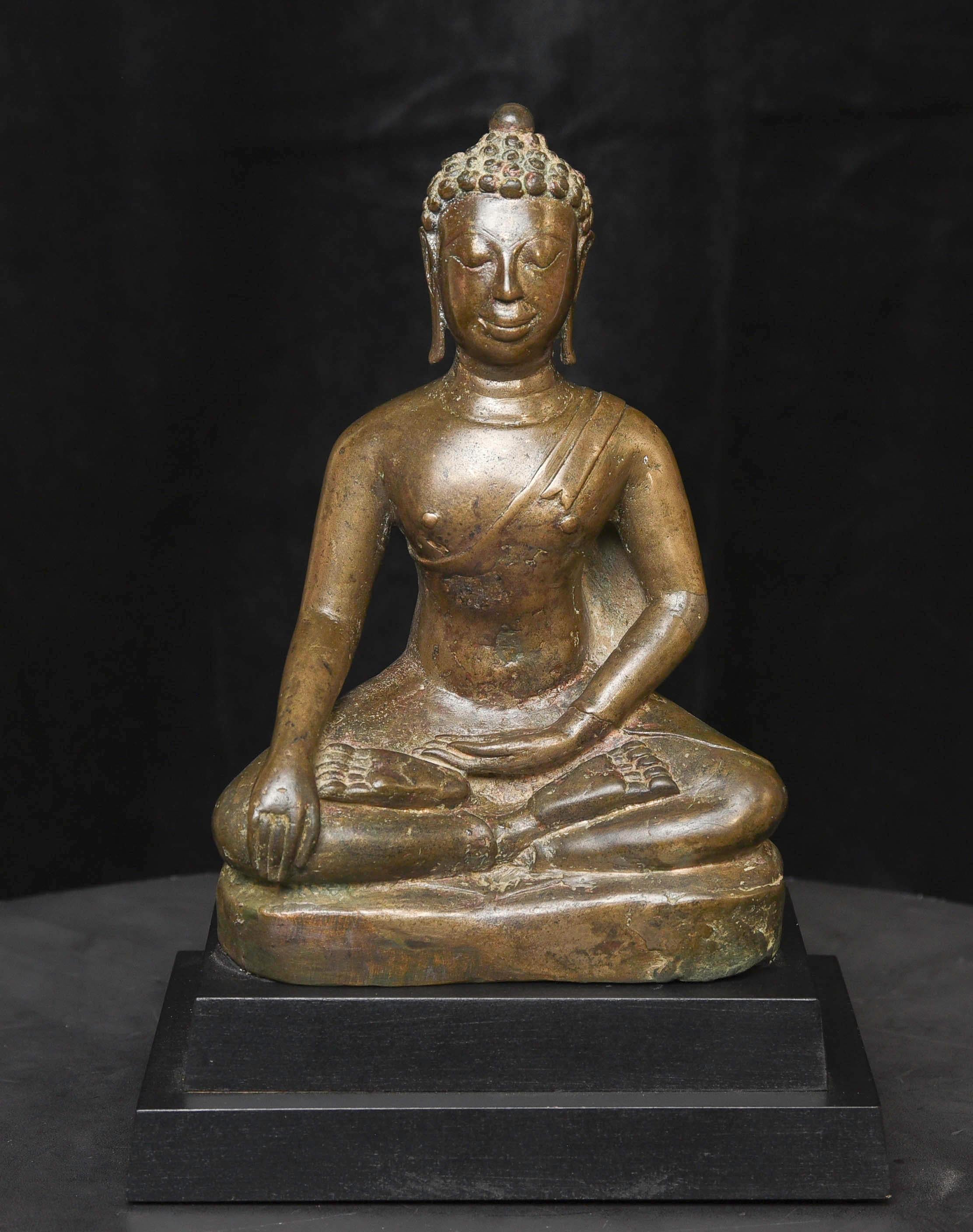 This may be my all-time favorite of all the SE Asian Buddhas I have ever owned--and that is saying a lot, as I have owned many thousands over a thirty-five-year period. It is a very special transitional Buddha from the Dvarati period to the very