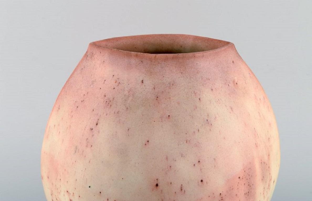 Preben Brandt Larsen, Danish ceramicist. Large unique vase in glazed stoneware. 
Beautiful peach glaze. Dated 1945.
Measures: 23 x 23 cm.
In excellent condition.
Signed and dated.