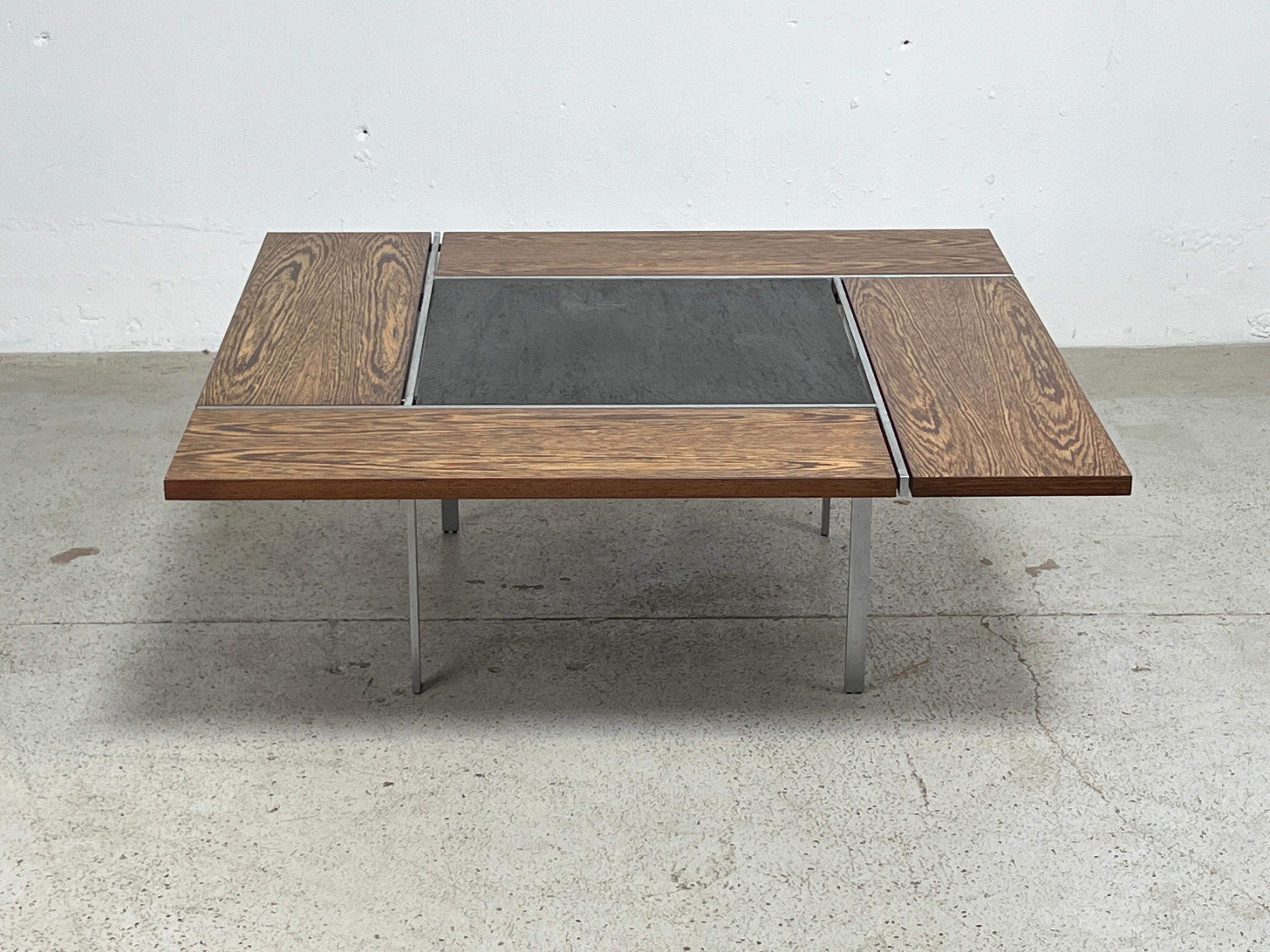 A coffee table made of stainless steel, Wenge and slate. Designed by Preben Fabricius and Jørgen Kastholm for Bo-Ex. 