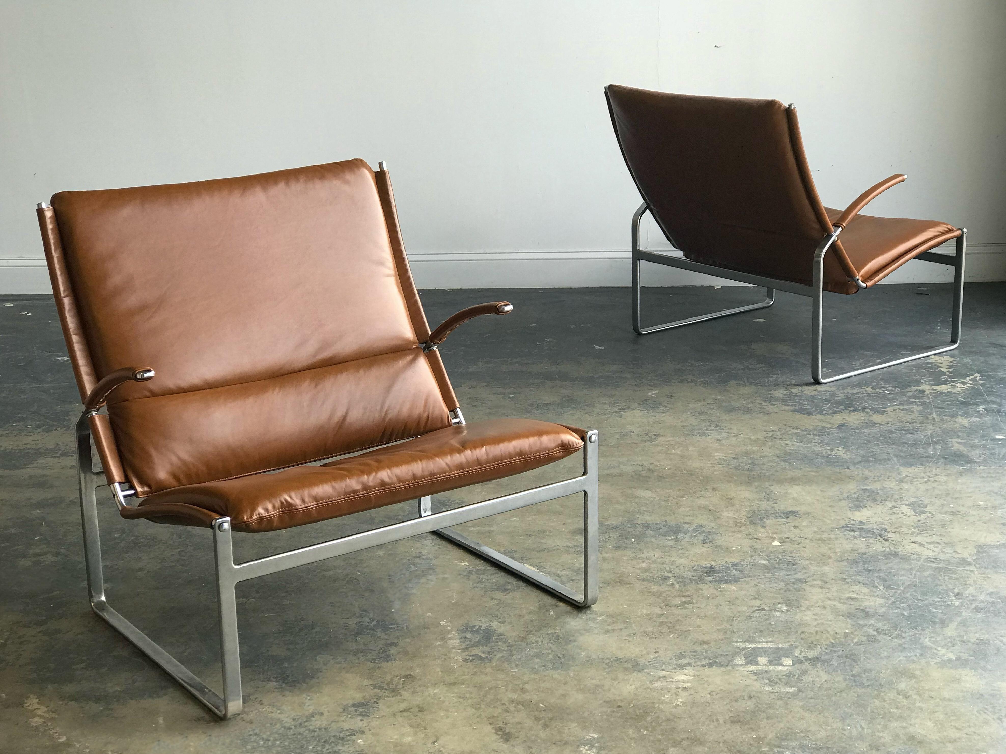 Preben Fabricius & Jørgen Kastholm lounge chairs in steel and new “Brown Addict” leather from Carol Leather. Despite a grand stature and profound presence, they are surprisingly airy in their profile. Excellent modernist chairs with quality