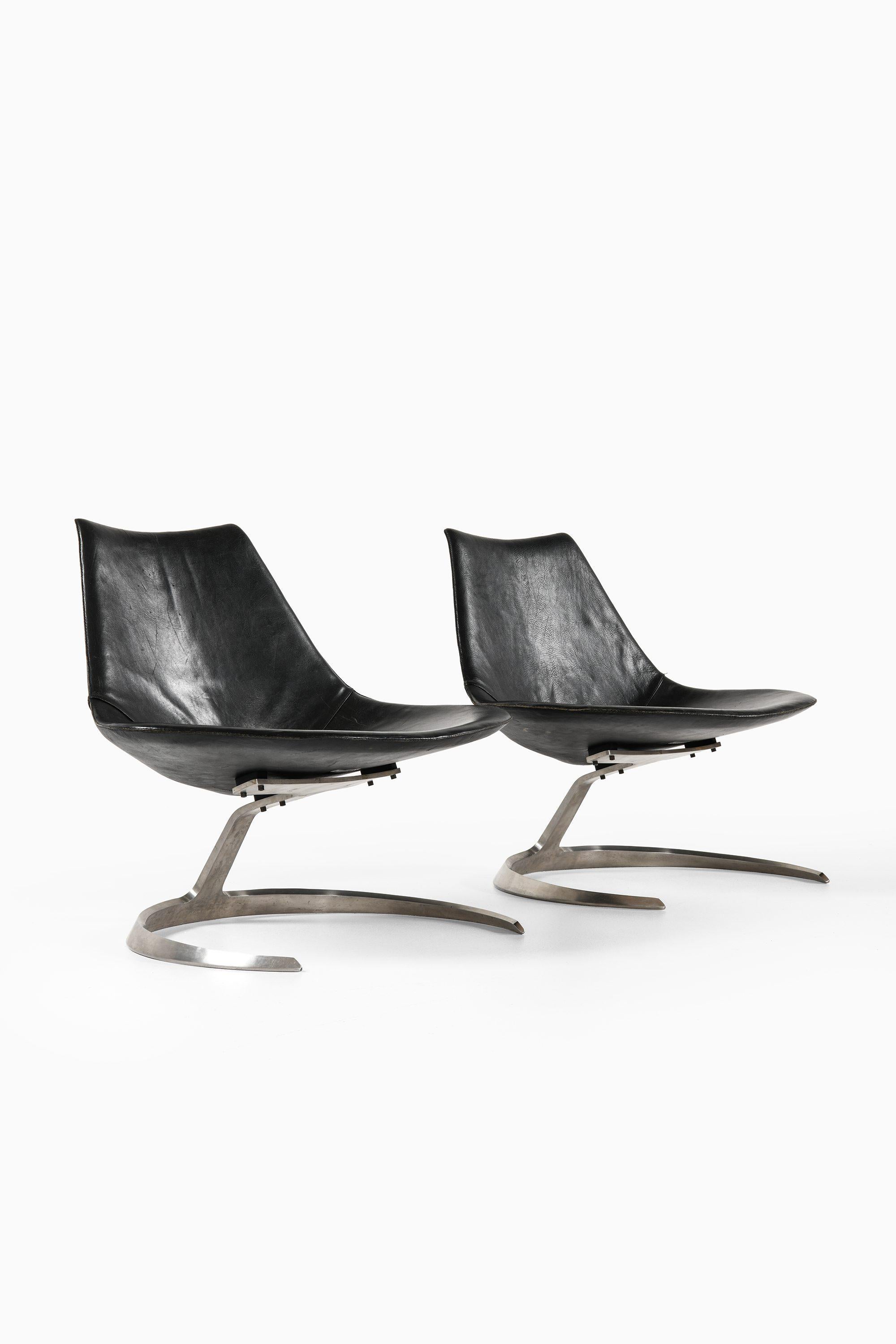 Scandinavian Modern Preben Fabricius & Jørgen Kastholm Scimitar easy chairs Steel and Leather, 1960s For Sale