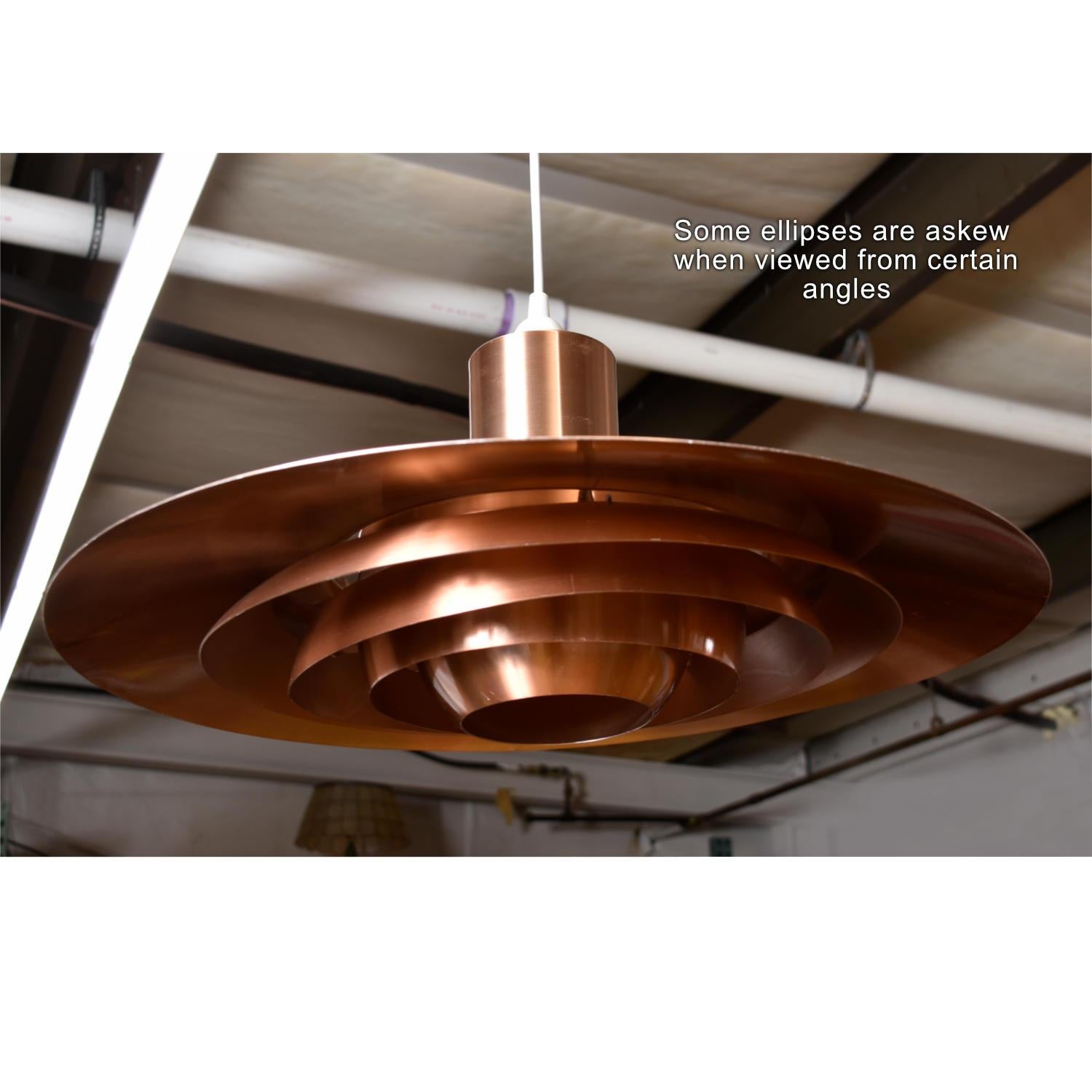 Vintage Preben Fabricius & Jørgen Kastholm multi-tiered copper color Danish pendant light. The fixture is intended to dangle from the ceiling. The copper colored metal shade is original. The electric components (light fixture and cord) are all new.