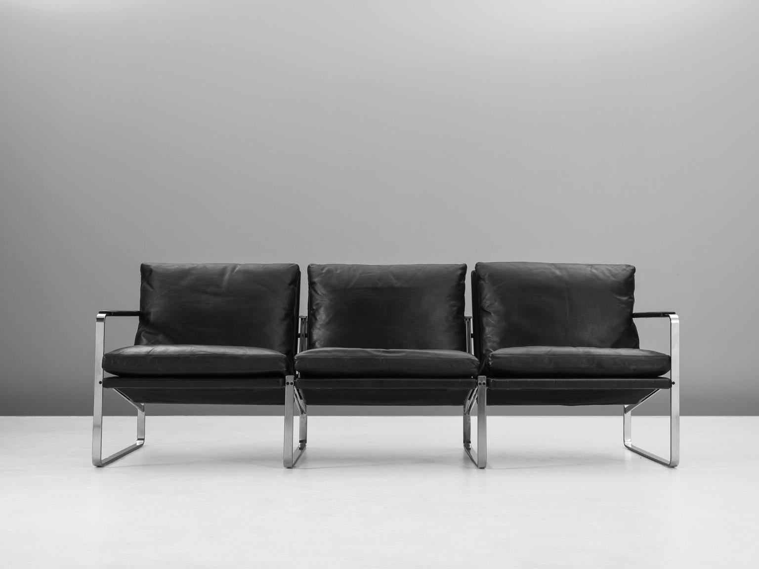 Preben Fabricius for Walter Knoll, three-seat sofa, black leather and steel, 1970s.

This very beautiful black sofa with four square steel base's is very comfortable. The soft black leather cushions provide the back with excellent support and it's