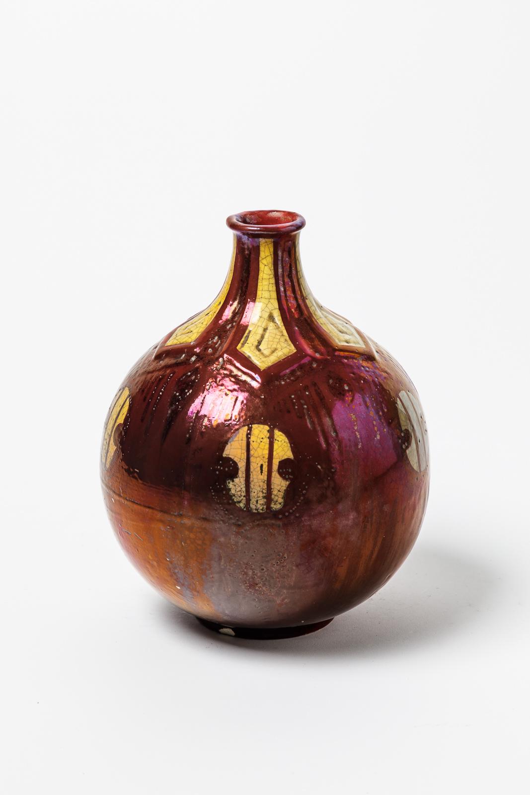 Émile and Bruneau Balon

Realised circa 1930

Original art deco ceramic vase realised in Blois, unique handmade piece

Shiny red and yellow ceramic glazes colors

Signed under the base 

Some small chips at the base that can be restored by