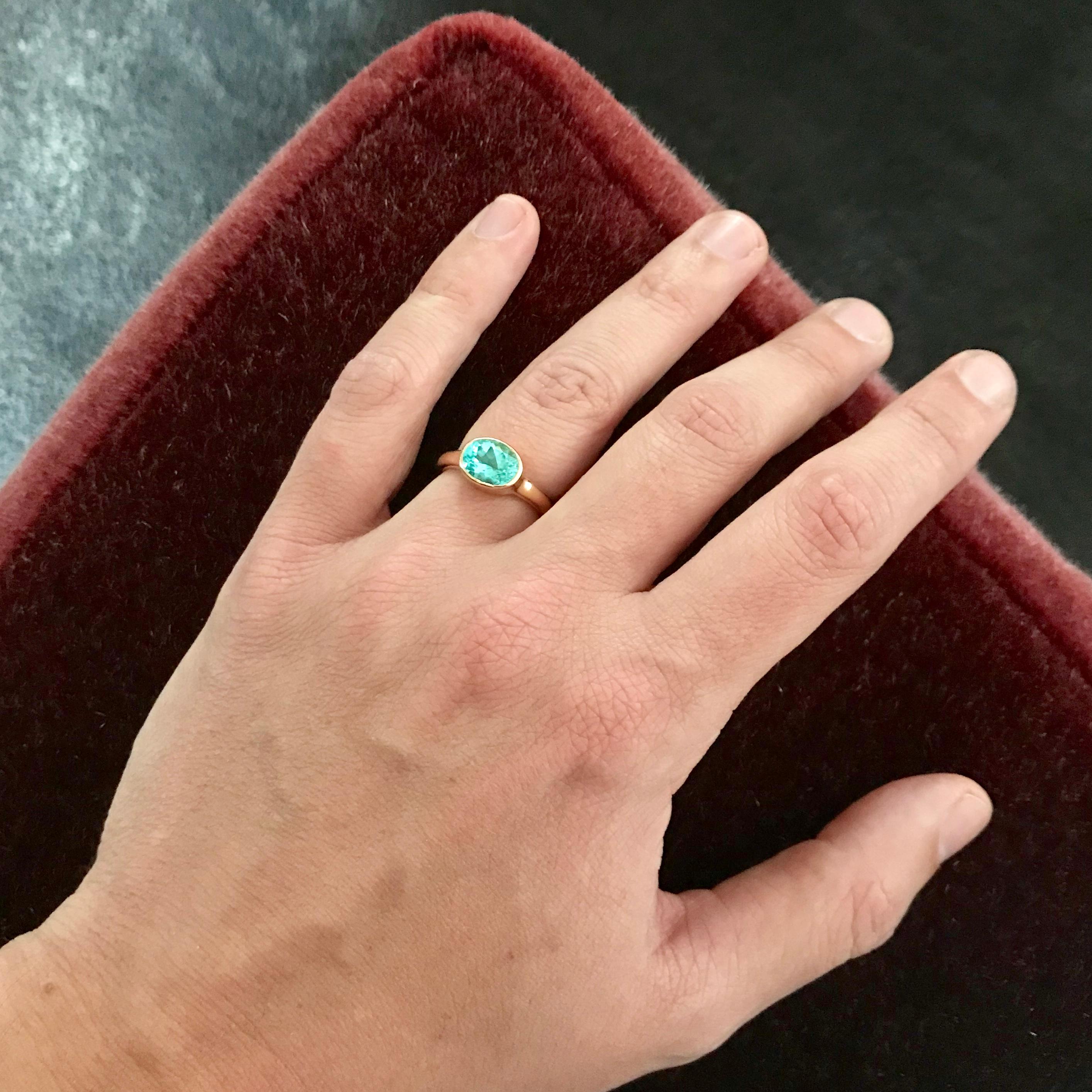 Vivid turquoise and extremely rare African paraiba tourmaline in a beautiful and very comfortable setting in 18 carat rose gold dedicated to flatter the beauty of this 2.43 carat gemstone.

ring size 57 (US 8.0)