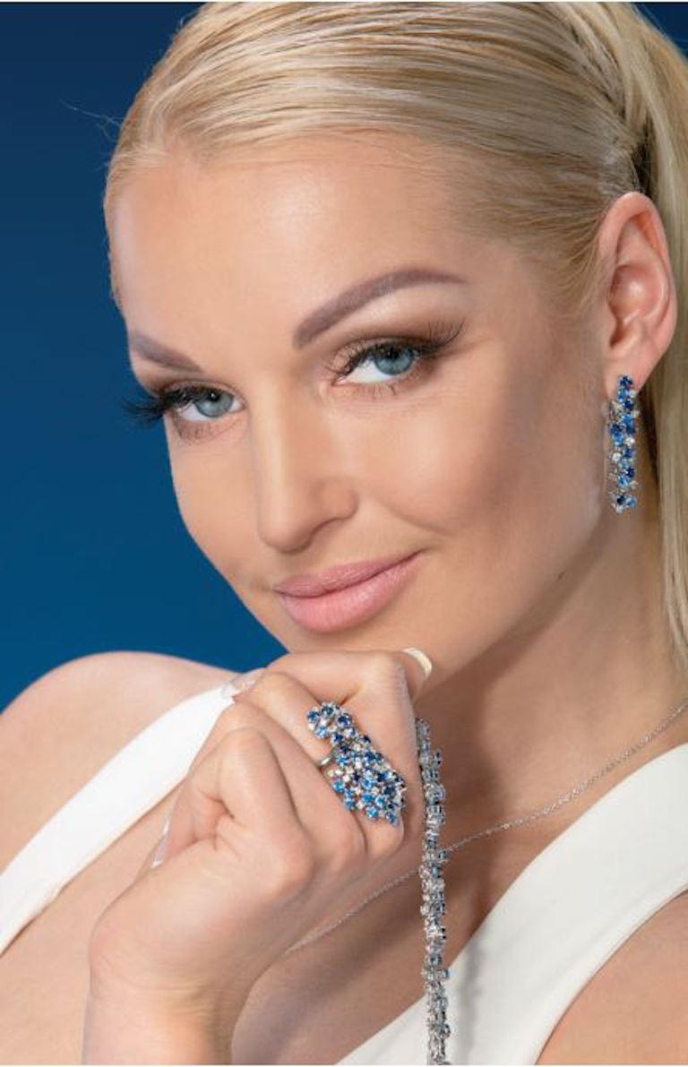 Anillo Oro 
Diamante 29-Ronda 57-0,68ct-4/5A 
Sapphire17-Round-3,48ct- 
Zafiro púrpura 17-Round-2,32ct
Peso 17,22 gramos 
Ajustable a cualquier tamaño

NATKINA es una marca de joyería ginebrina con un legado de antiguas tradiciones de joyería fina