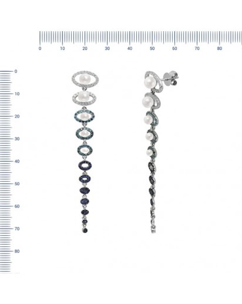 Earrings White Gold 18 K

Diamond 76-RND-0,51-G/VS2A 
Diamond 78-RND-0,58ct
Pearl diameter 2,5-5,0 - 10-4,52ct
Sapphire 64-0,65ct

Weight 8.61 gram

With a heritage of ancient fine Swiss jewelry traditions, NATKINA is a Geneva based jewellery brand,