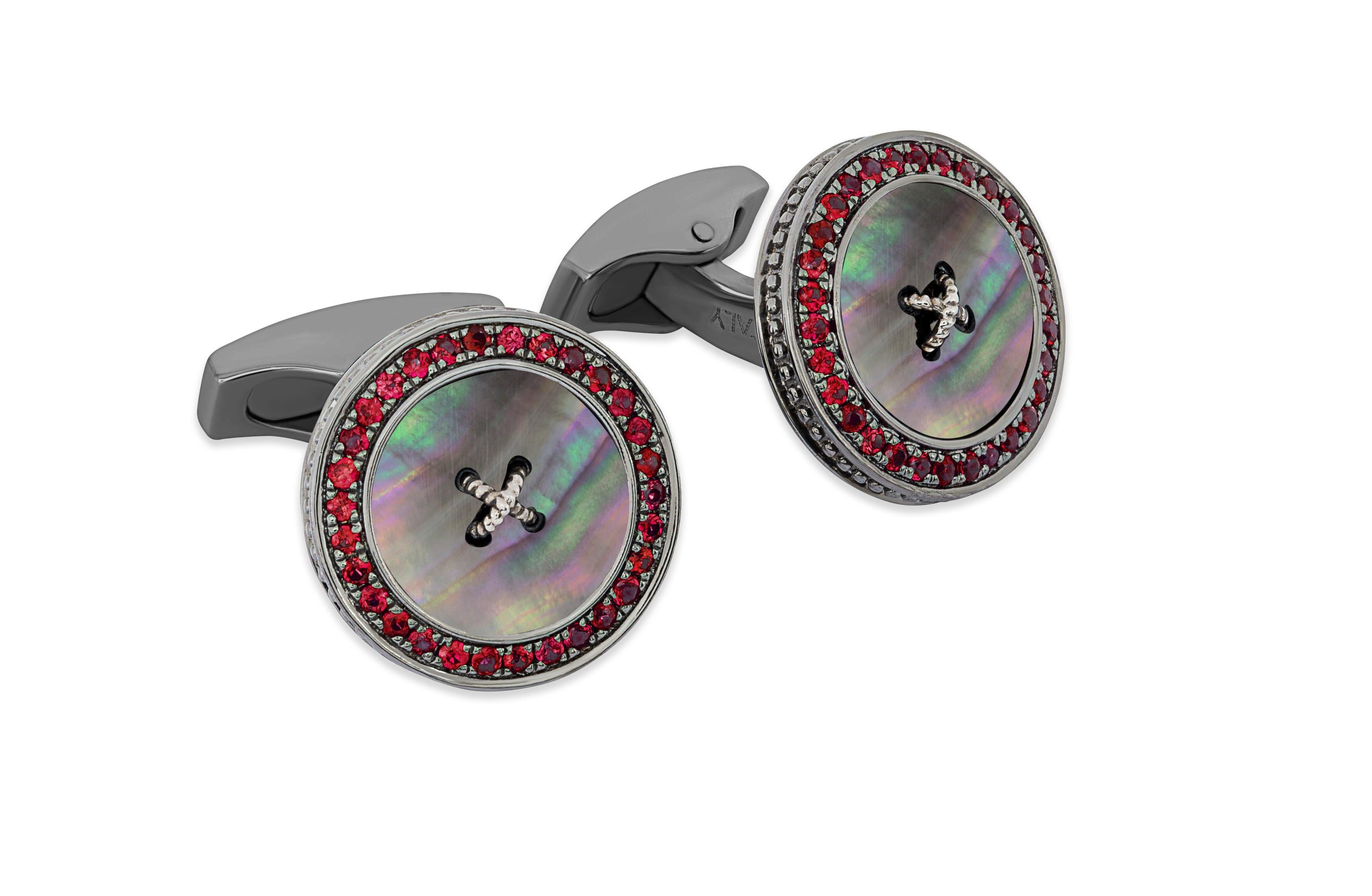 Precious Button Cufflinks with Black Mother of Pearl & Rubies

A luxurious reinvention of the classic tailoring button. This button is meticulously crafted from three materials, silver, semi-precious stone and precious rubies or sapphires. The