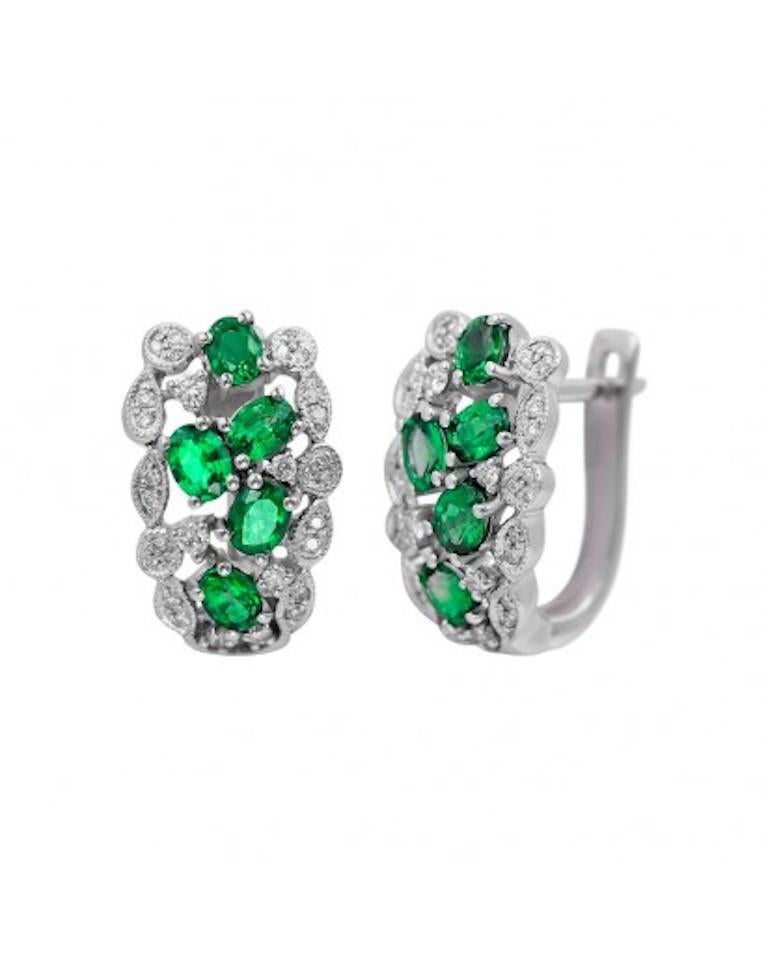 Ring 14K (MatchingEarrings Available)
Diamond 11-Round 57-0,14-4/5A
Diamond 22-Round 57-0,13-4/5A
Emerald 8-Oval-1,9 3/(5)З₁A
Weight 14,41 gram
Size 17 (adjustable)

NATKINA embraces the principles of modern Feminism — meaning, we believe a woman’s