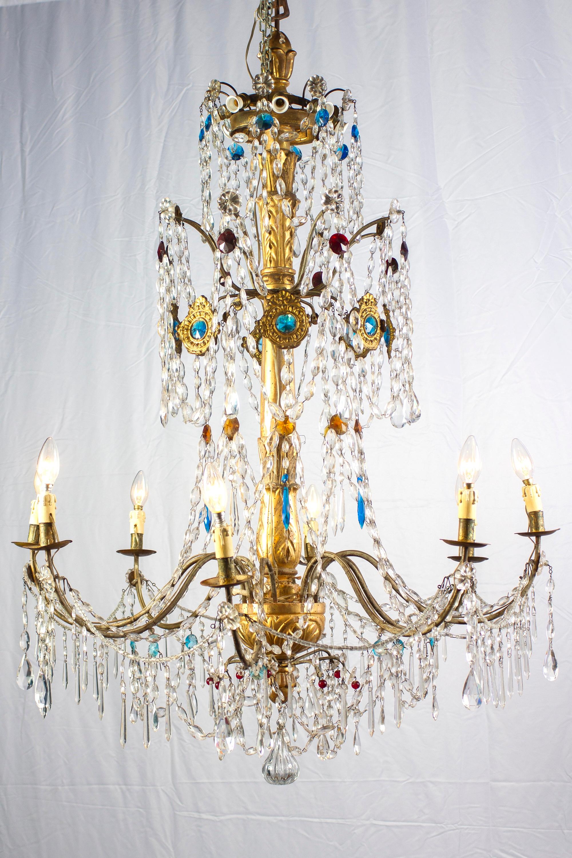  Elegante y finamente tallada base central de madera dorada con 8 brazos en 