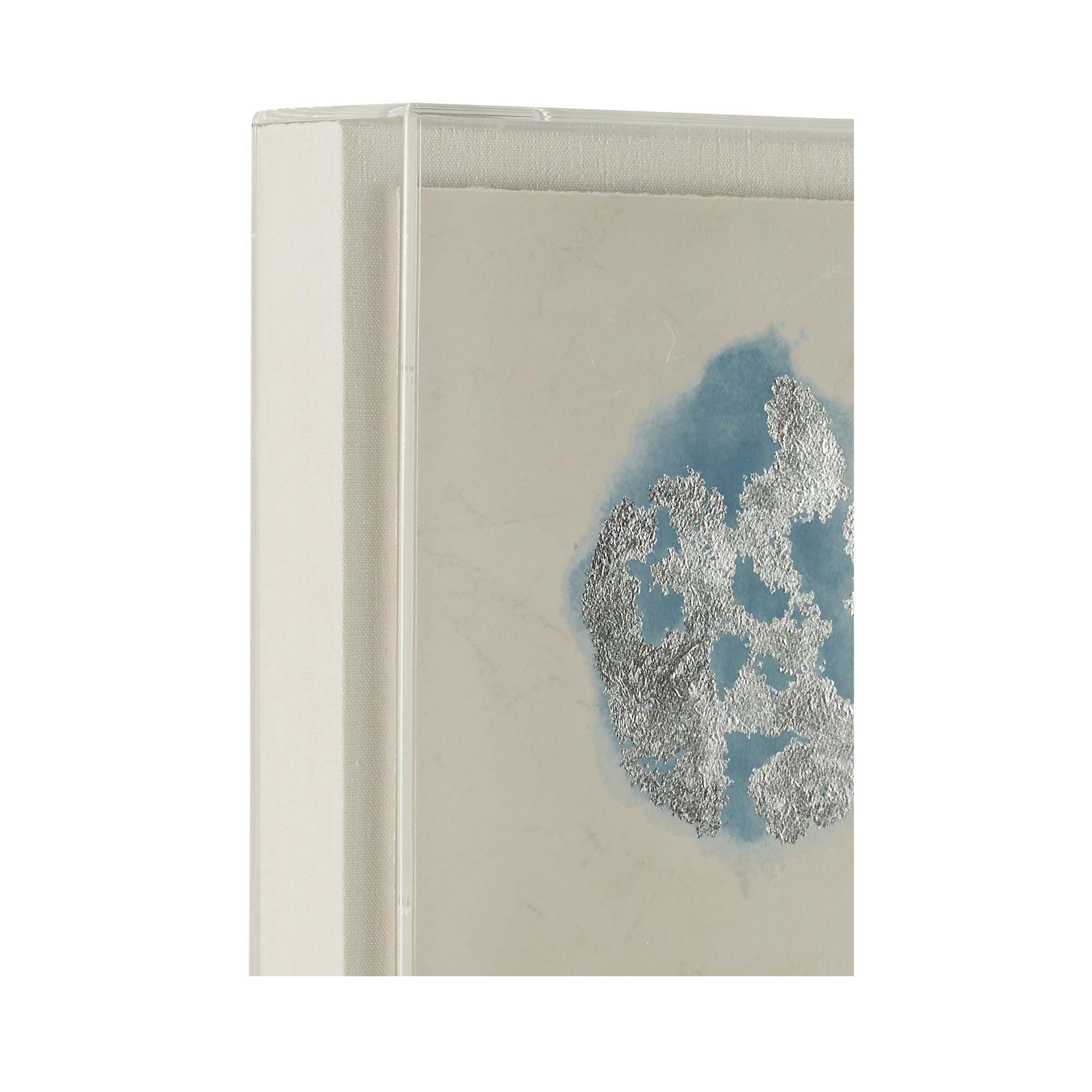 Color Island Series is playful in color and vibrancy. Created with layers of silver leaf over color inks on an aged paper background, the splashes of silver leaf over light powder blue, iris blue, and slate add excitement to the antiqued background.