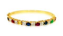 Edles Armband mit mehreren Edelsteinen und Diamanten aus 18k Gold