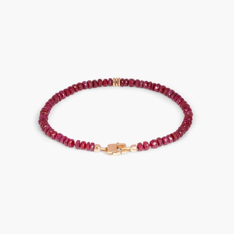 Precious Stone Bracelet with Ruby in 18K Rose Gold, Size L

Faceted ruby beads sit together with three 18k rose gold discs and a matching rose gold lobster clasp. A hand-crafted piece, with each raw stone cut to attract the natural light, causing a