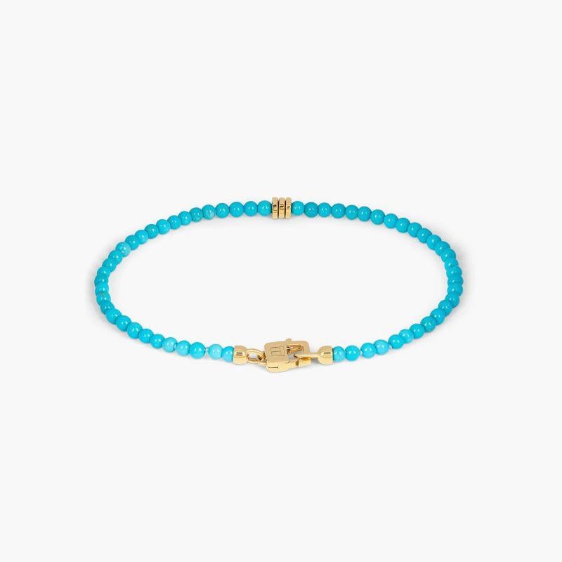 Precious Stone Bracelet with Turquoise in 18K Gold, Size L

Sleeping beauty turquoise are highly sought after and considered the finest turquoise due to its even body colour. Our faceted beads sit together with three 18k yellow gold discs and a