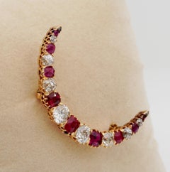 Precious Victorian 4.40 Carat Old Mine Diamond 3.0 Carat Ruby Crescent Brooch