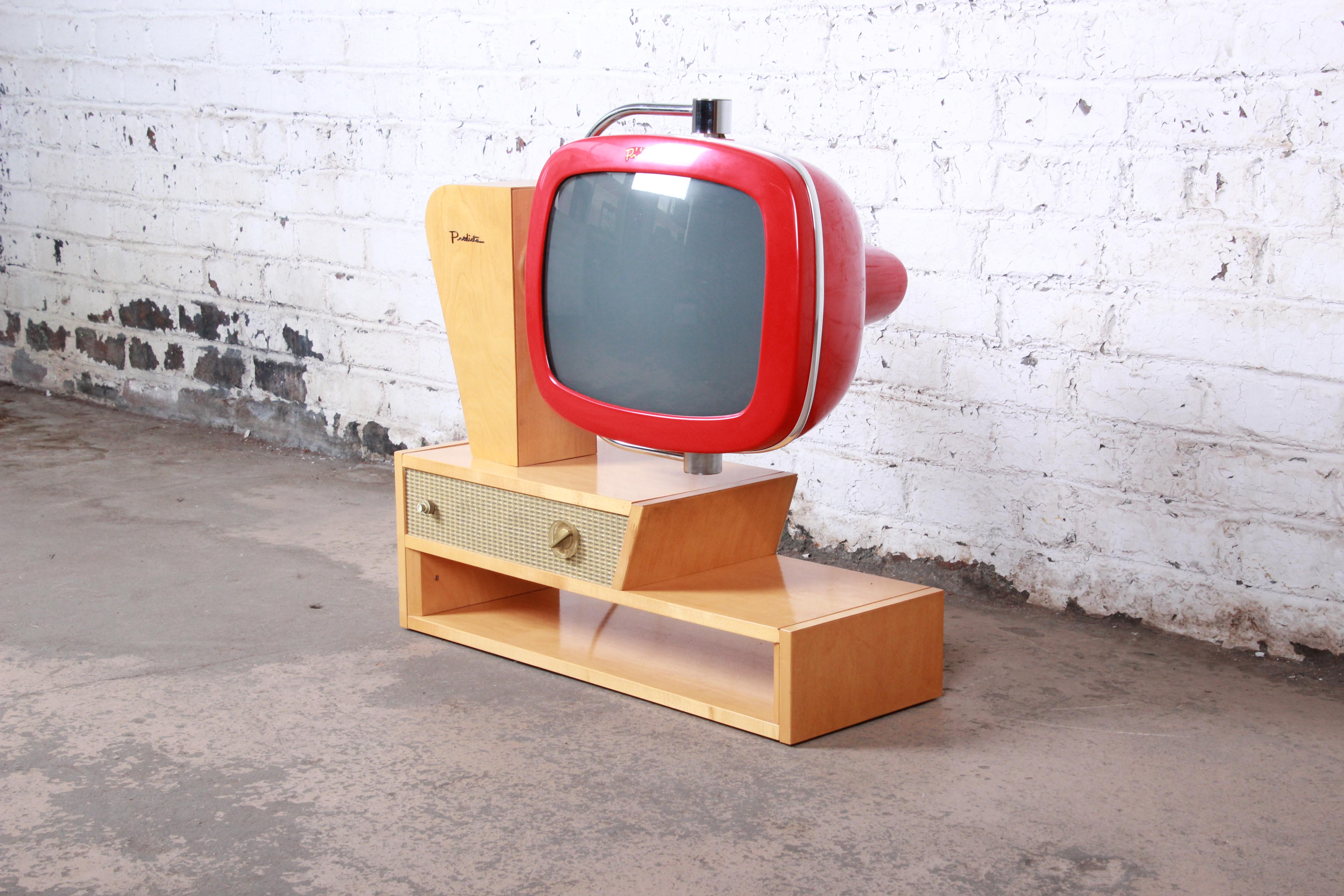 An exceptional Mid-Century Modern style Predicta Chalet television produced by Telstar. The only Predicta TV ever produced with two-axis rotation! The Chalet (affectionately dubbed the Drive-In), another Telstar original, is created with the fun