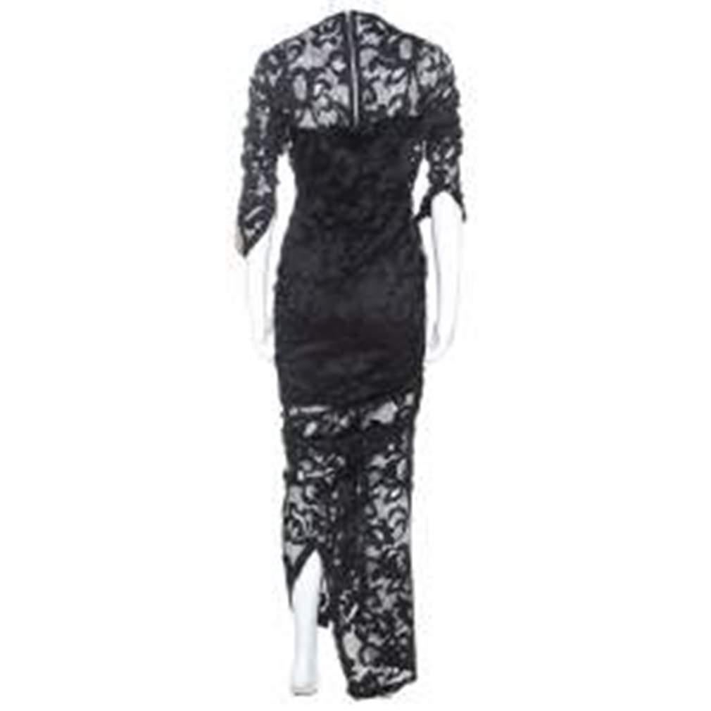 This black dress from Preen has a brilliant design, making it a must-have piece in your closet. This lace creation has a great fit, ruched details and embellishments. It is sure to be your companion season after season.

