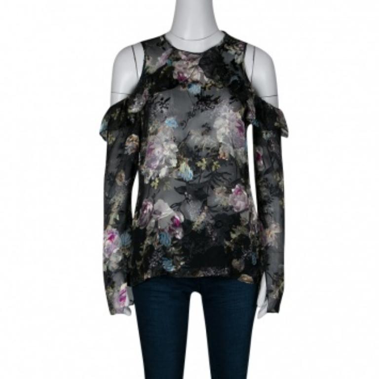 Labellisé pour ses imprimés et ses robes flatteuses, Preen By Thornton Bregazzi est la marque préférée des célébrités. Ce top Alva est confectionné en soie mélangée de couleur noire et présente un magnifique imprimé floral. Il est doté d'une épaule