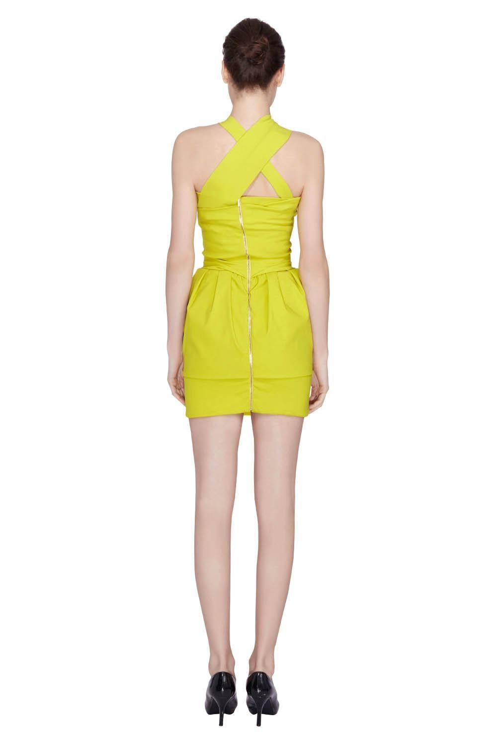 Welcome summer with this fun Preen by Thorton Bregazzi cocktail dress. It is perfect to wear at a beach party or for an evening outing. It features a gorgeous citrus green color, draped bodice and stylish crisscross neckline. Complete your look with
