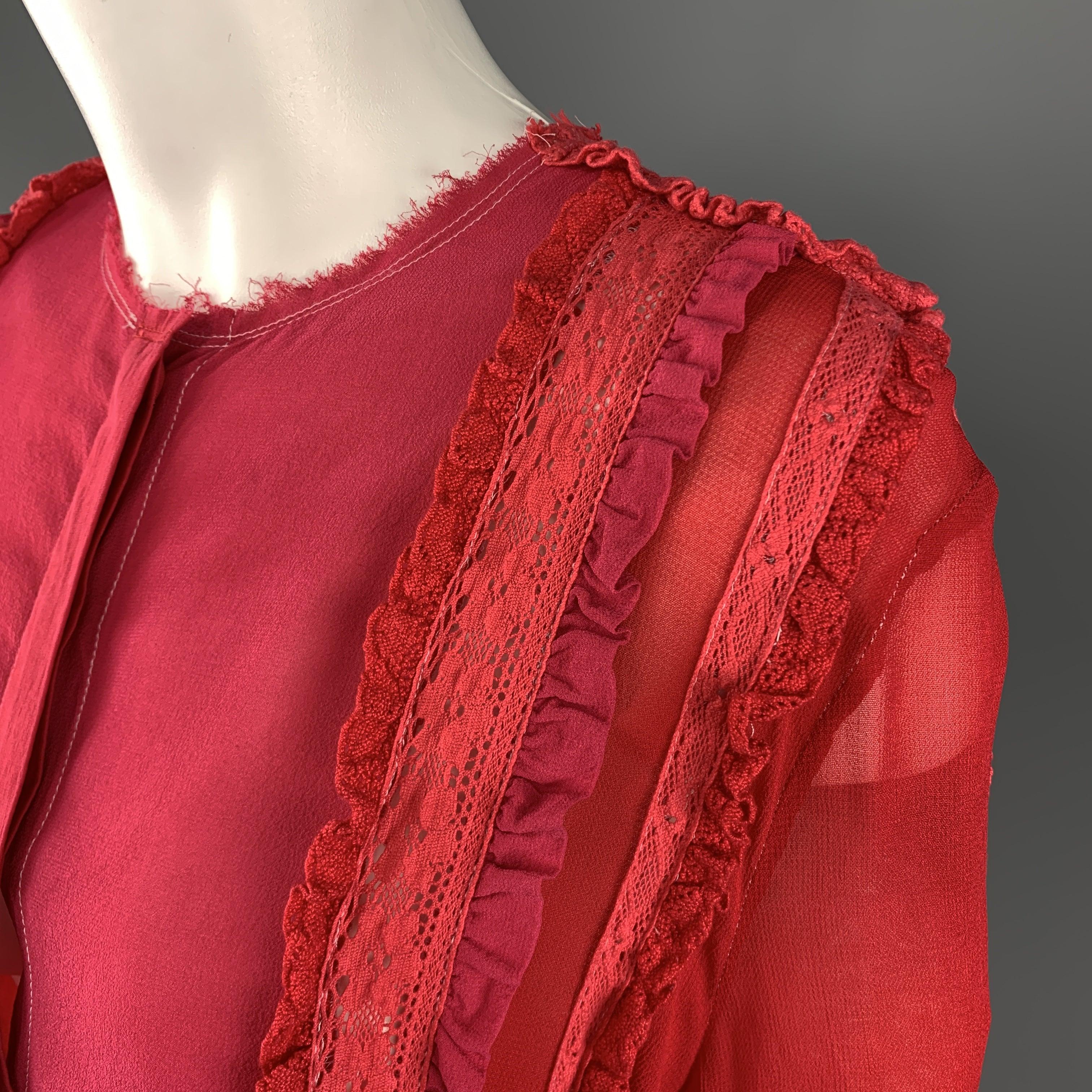 PREEN LINE blouse comes in fuchsia and red color block crepe chiffon with lace knit ruffled piping trim throughout and frayed collarless neckline. 
Excellent Pre-Owned Condition.
 

Marked:   S
 

Measurements: 
  
l	Shoulder: 17 inches 
l	Bust: 44