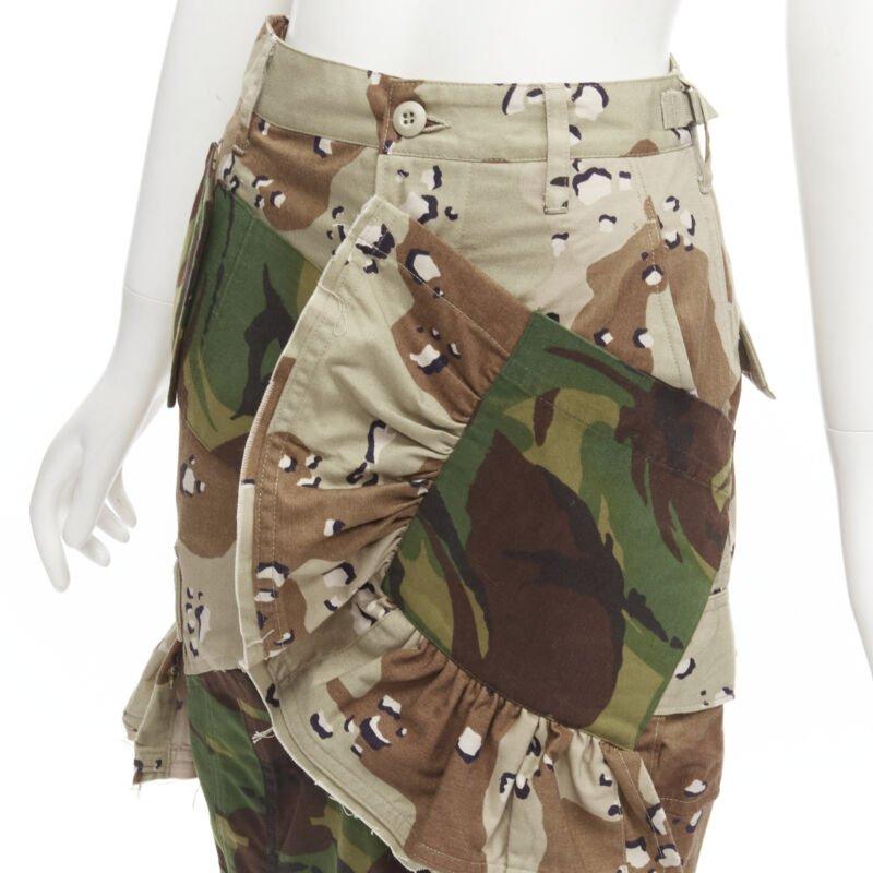 PREEN mixed green khaki camo patchwork ruffled deconstructed cargo skirt XS
Reference: AAWC/A00324
Brand: Preen
Designer: Thornton Bregazzi
Material: Cotton, Blend
Color: Green, Green
Pattern: Camouflage
Closure: Button Fly
Lining:  Fabric
Extra