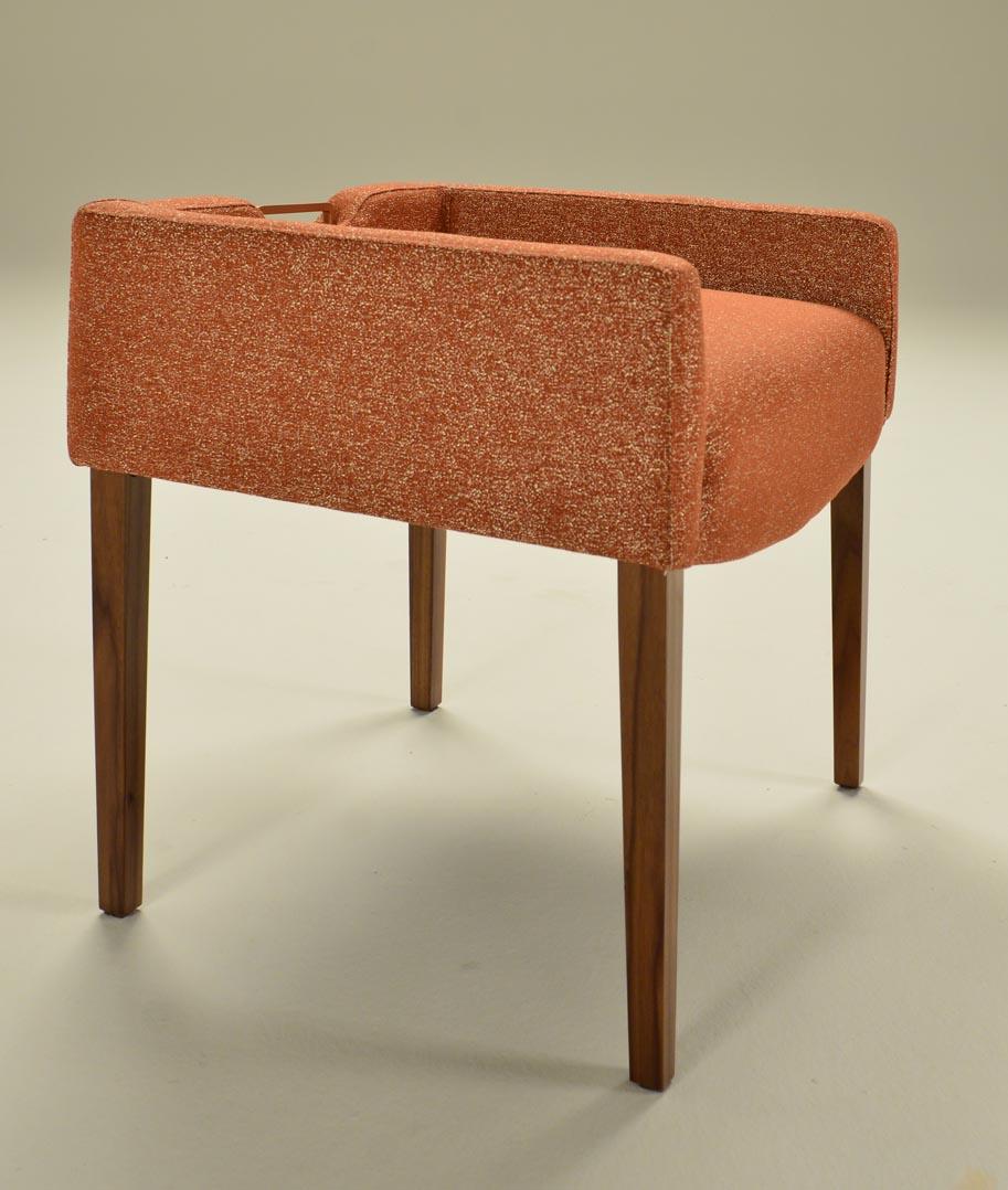 Stool, legs in Black American Walnut matte finish, covered in COM fabric (2.00 mt), rose gold metal handle on back top.