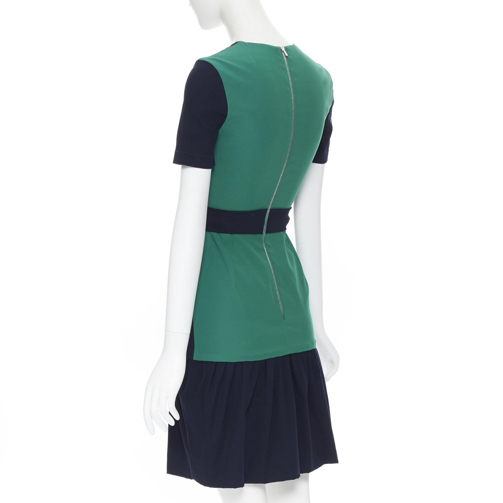 PREEN THORNTON BREGAZZI navy blue green colorblocked back cocktail dress XS
Reference: SNKO/A00041
Brand: Preen
Designer: Thornton Bregazzi
Model: Cocktail dress
Material: Viscose, Blend
Color: Navy, Green
Pattern: Solid
Closure: Zip
Extra Details:
