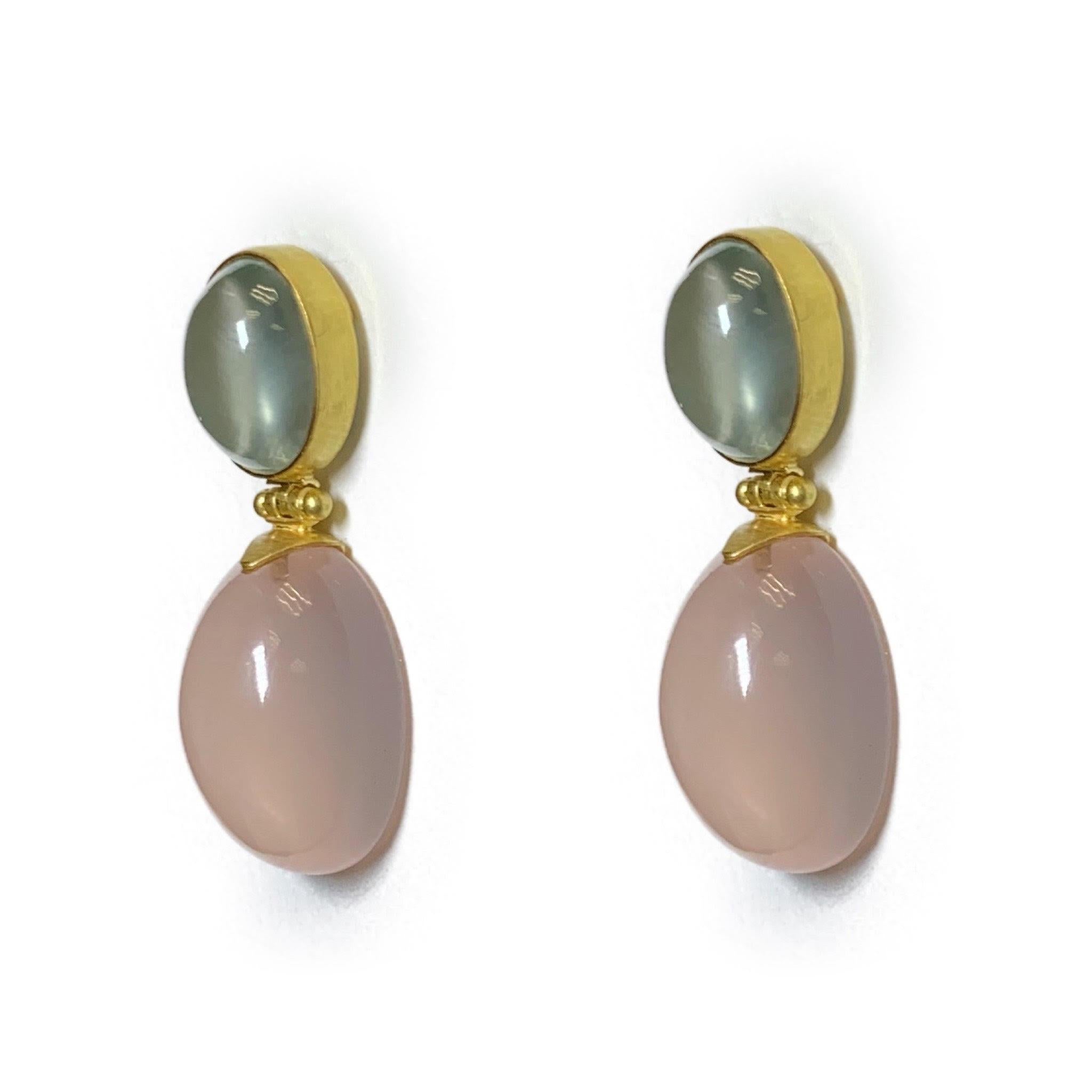 These beautiful two stone earrings are Cabochon cut Prehnite and Rose Quartz. Set in vibrant 18 Karat Yellow Gold with a soft satin finish. 

Prehnite is considered to be the stone of unconditional love and enhances precognition and inner knowing.