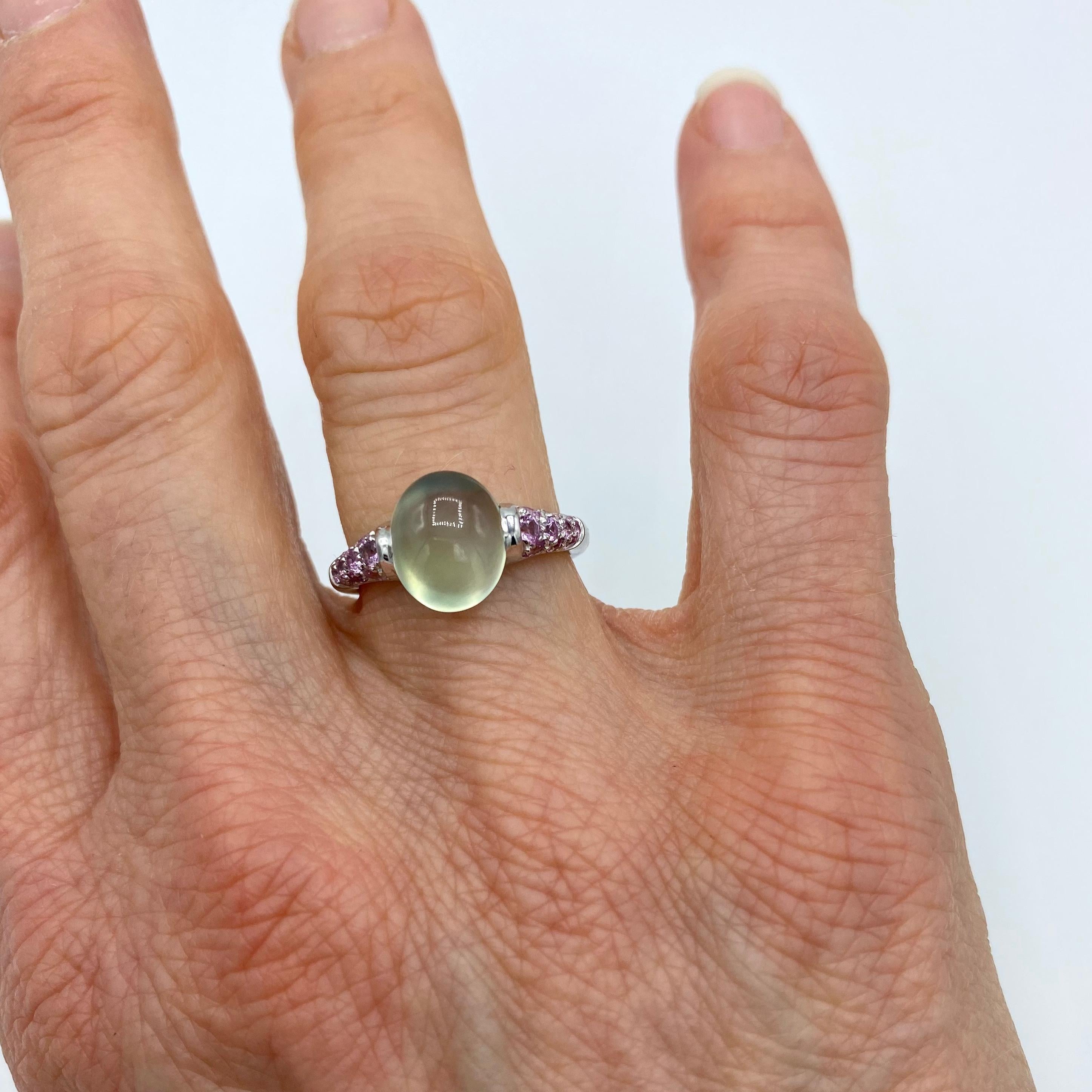 Prehnite Gemstone Pink Sapphire Red 18 Kt Gold Ring made in Italy
This ring in white gold has a prehnite cabochon cut and along the side there are a  total of 0.50 ct of pink sapphires.
This ring was designed in my workshop in Verona, Italy. All the