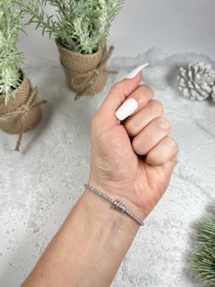 Bracelet tennis d'occasion en or blanc 14 carats et diamants