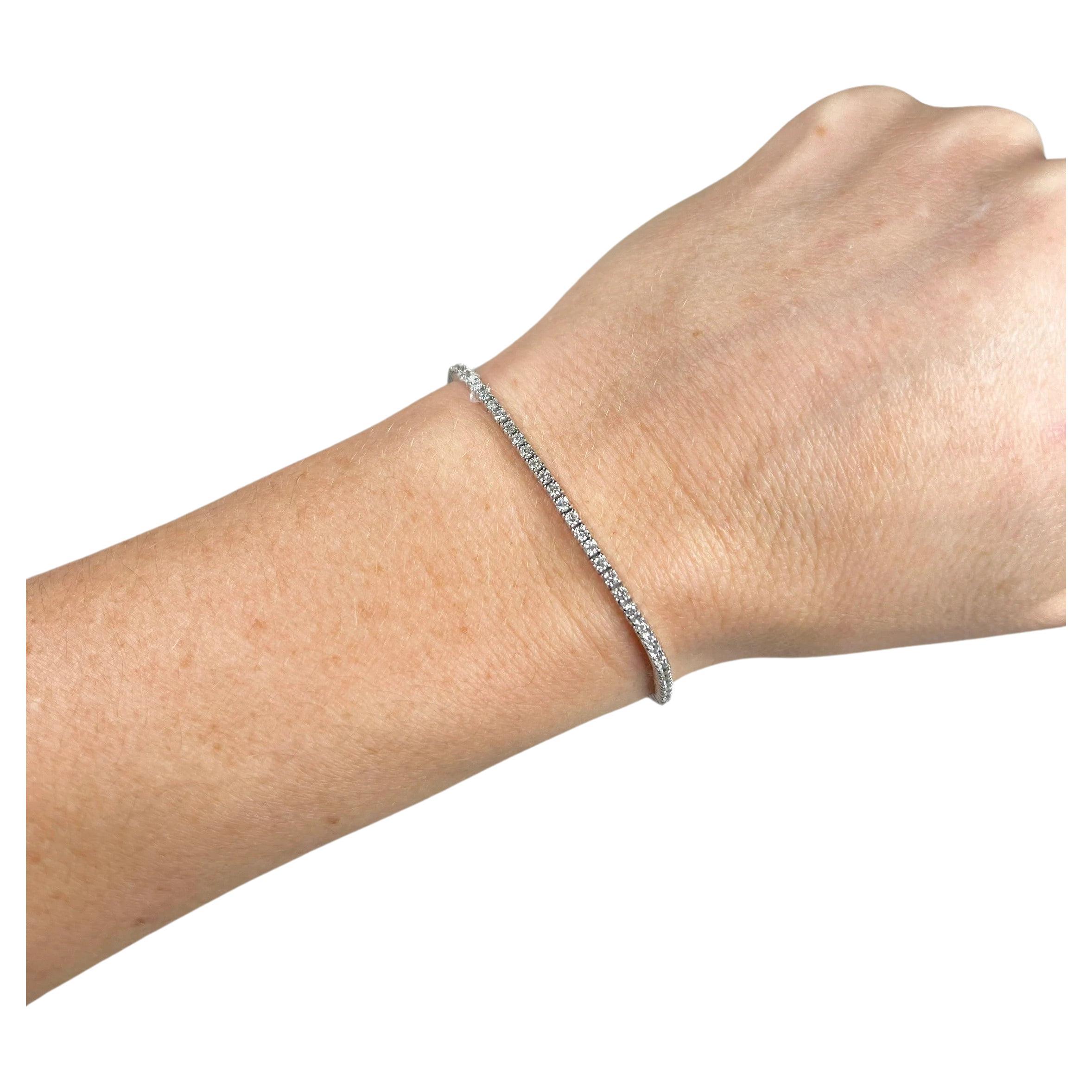 Bracelet tennis d'occasion en or blanc 14 carats et diamants en vente