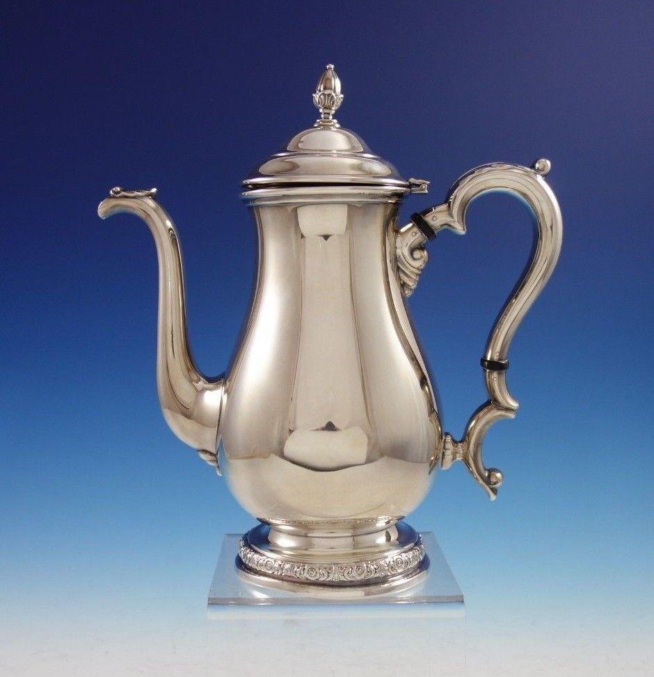 Beautiful Prelude by International sterling silver 5-piece tea set marked #C366. The set includes:
1 - Coffee pot: Measures 10 x 10 1/4 tall, and weighs 26.4 troy ounces.
1 - Tea pot: Measures 9 1/2 x 9 3/4 tall, and weighs 25.5 troy ounces.
1 -