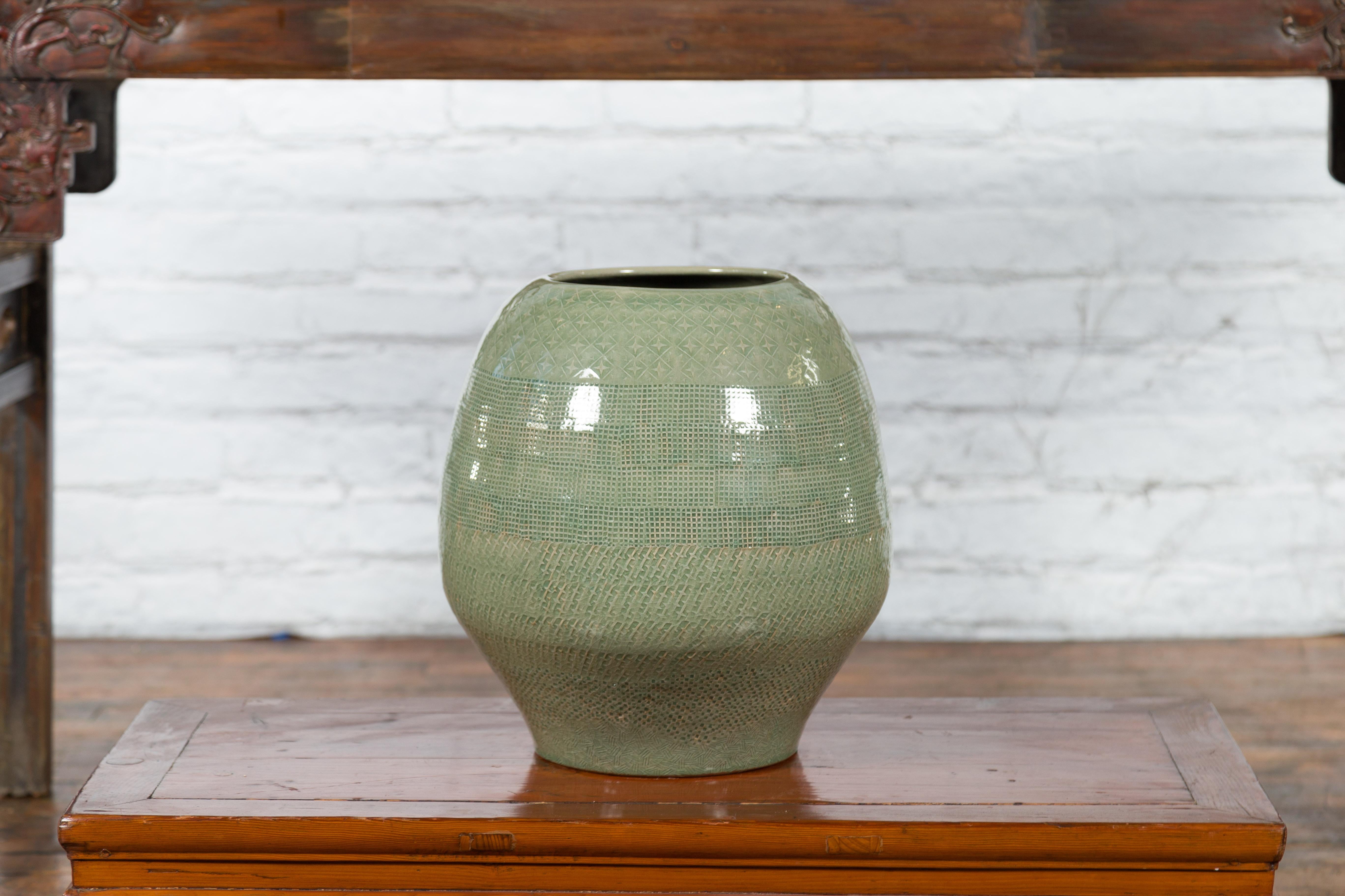 Thai Prem Collection Green Glazed Ceramic Artisan Vase with Geometric Décor For Sale